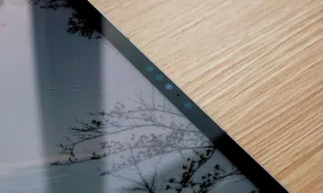 The front-facing FaceTime camera of the Apple 12.9-inch iPad Pro (6th gen) is above the display in portrait orientation, which many consider to be "the wrong place".