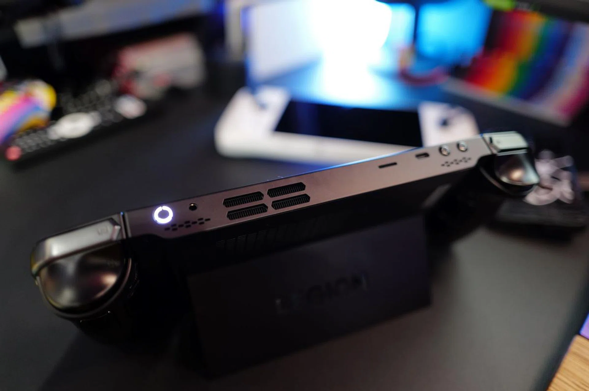 The handheld features two USB-C charging ports; one each at the top and bottom of the device.
