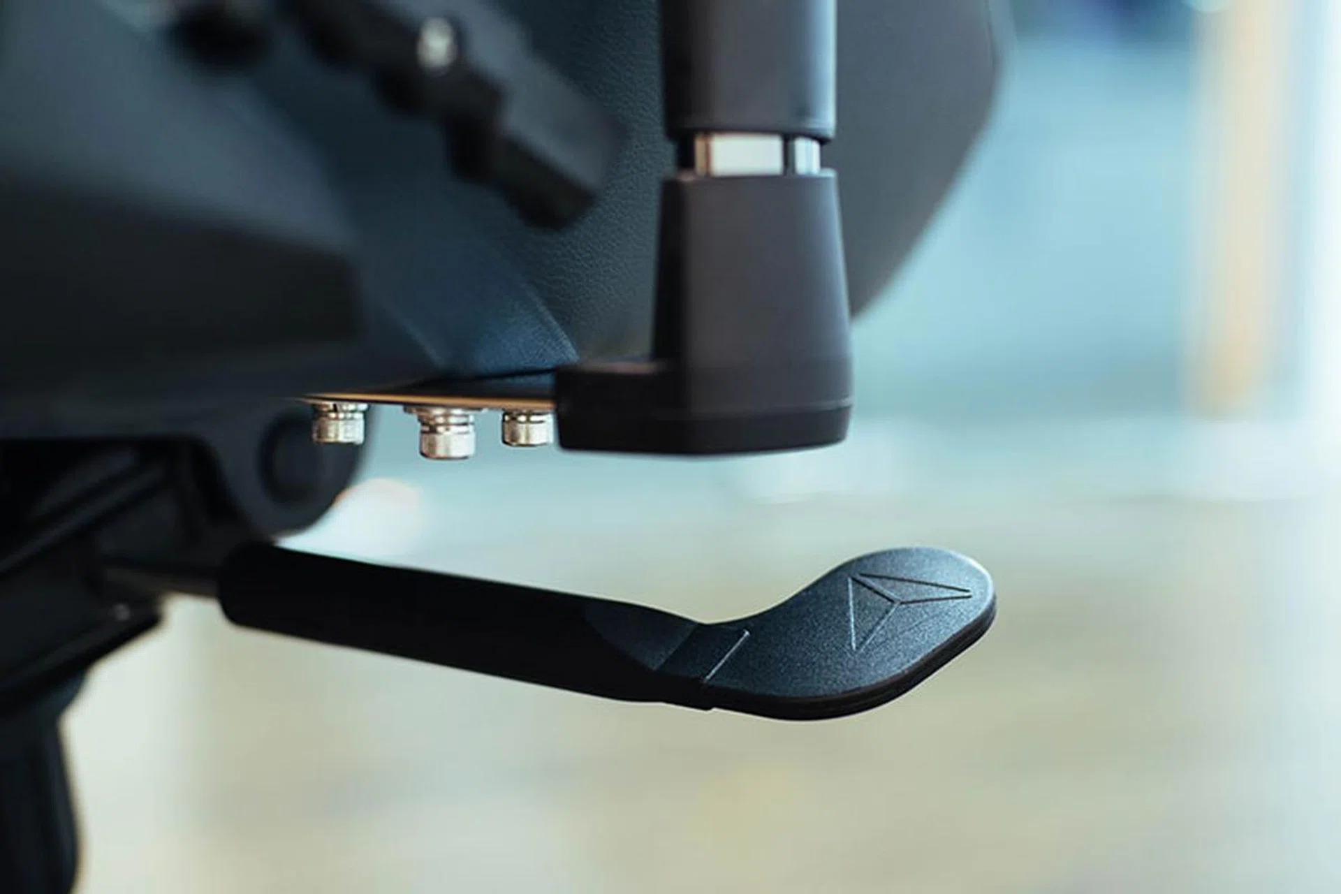 The Omega has a second lever on the left that you can use to lock the chair at your desired tilt angle.