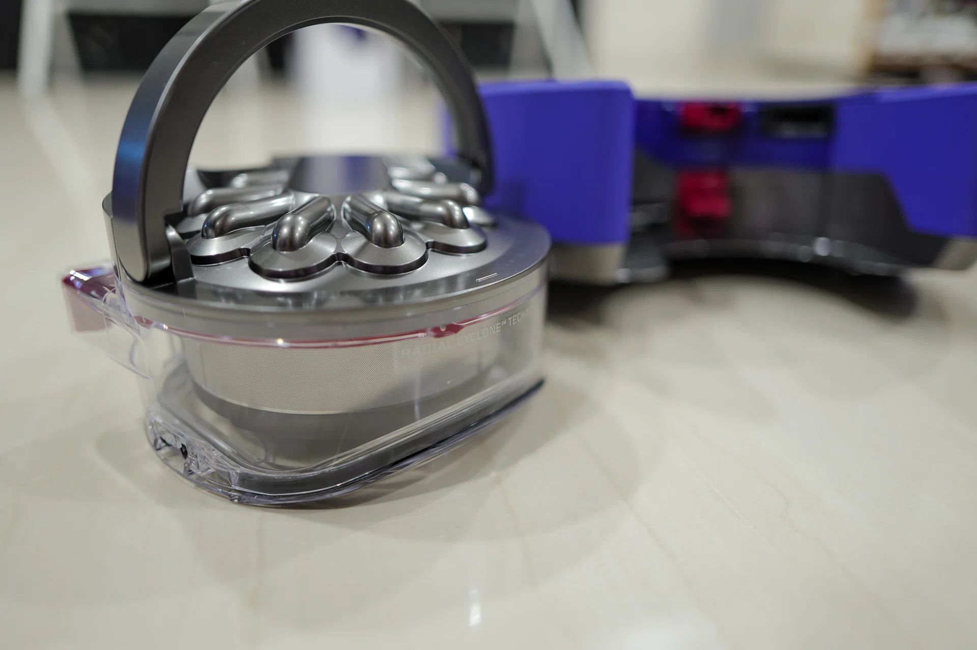 Dyson ought to make a cleaning tool that allows users to clean their vacuums' bin more effectively.