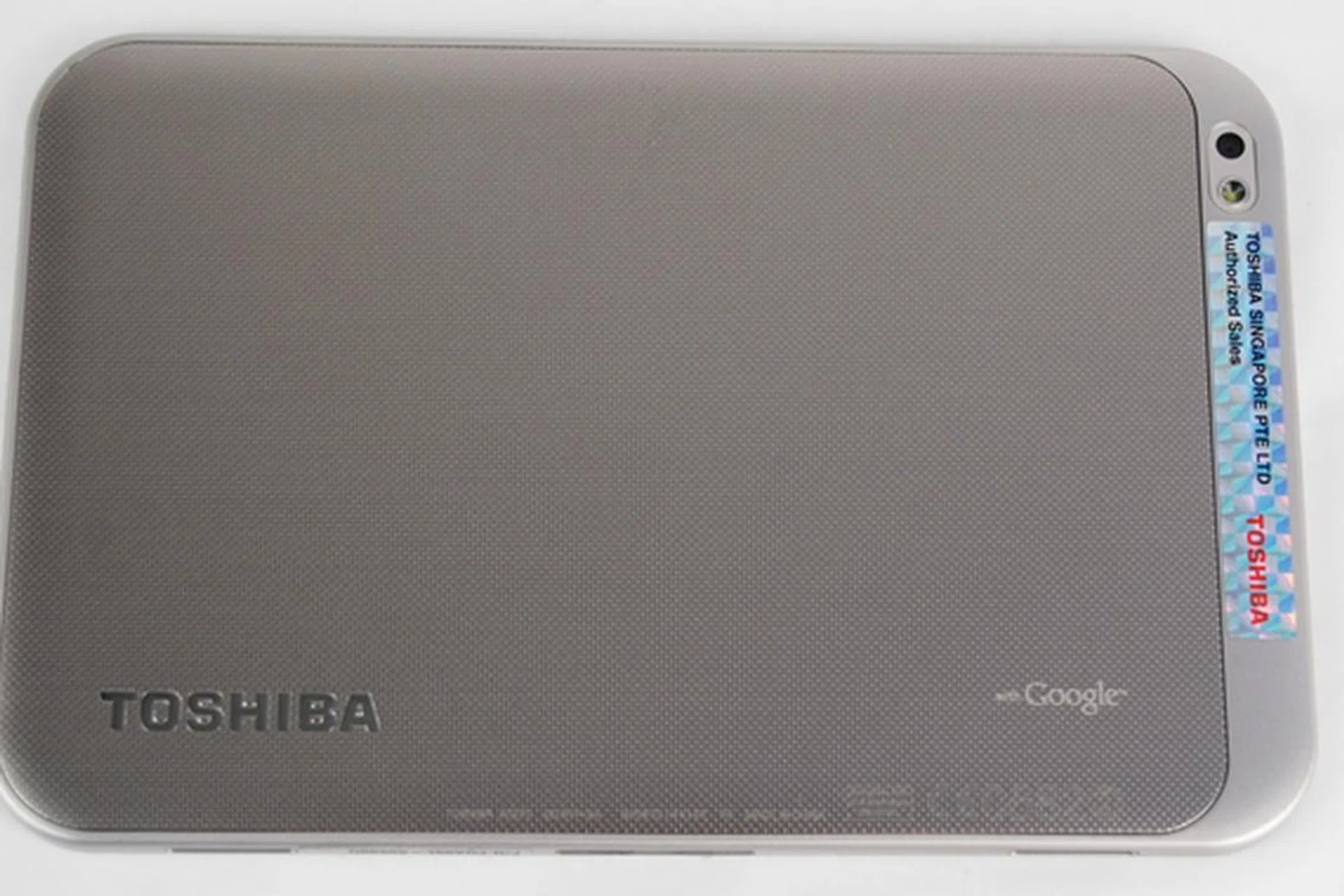 The textured back dominates most of the rear of the tablet. The section where the camera and LED flash are situated is clad in a lighter shade.