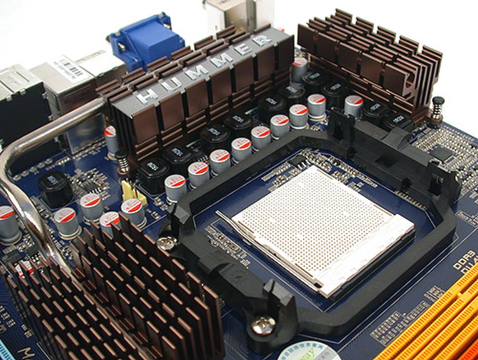 Heatsinks all around the CPU socket, linked by a heat pipe. Jetway has also gone with solid capacitors throughout the board for extra stability and reliability. 