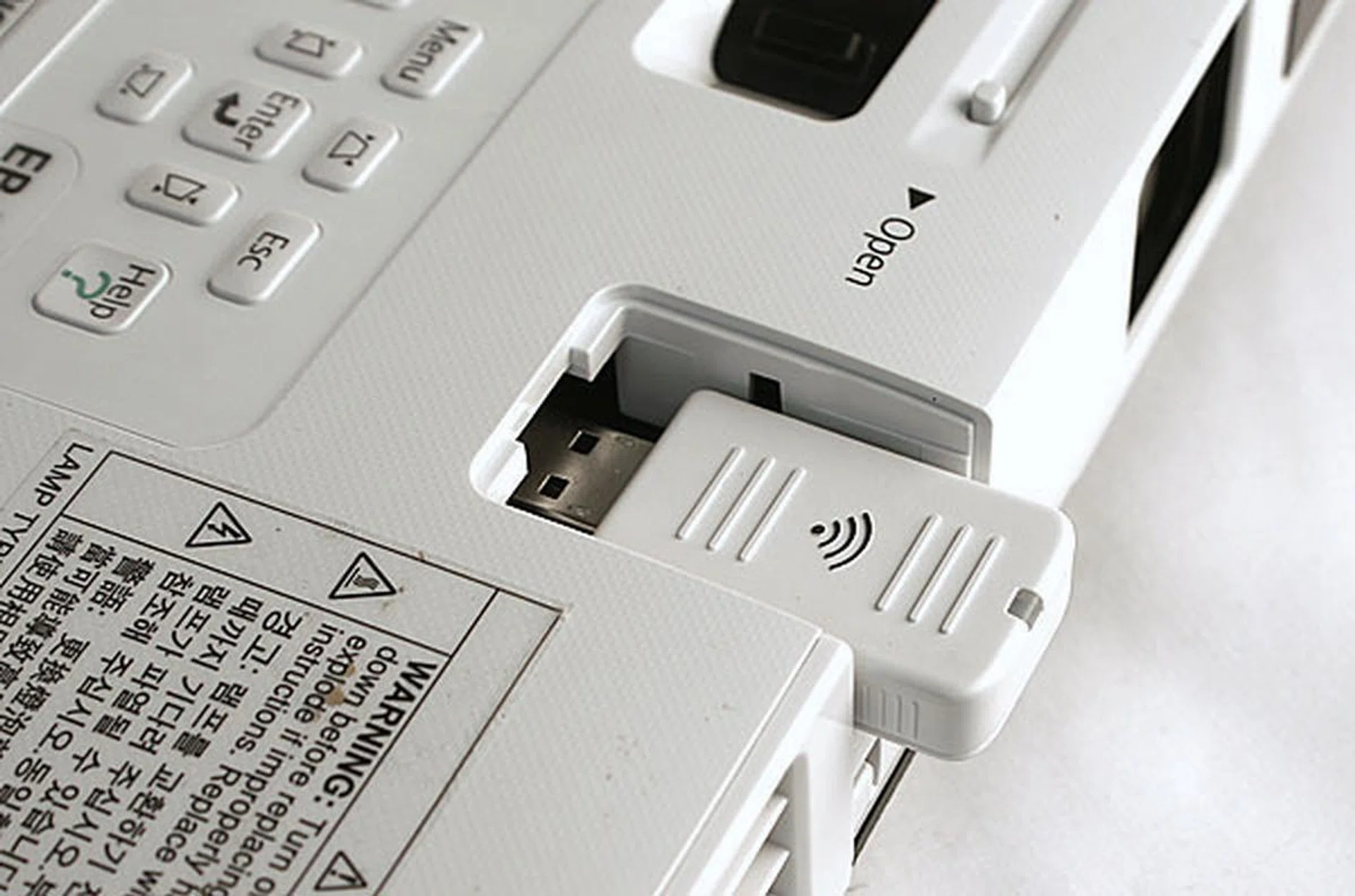 The wireless LAN module plugs into a USB port that's hidden under a screwed down cover.