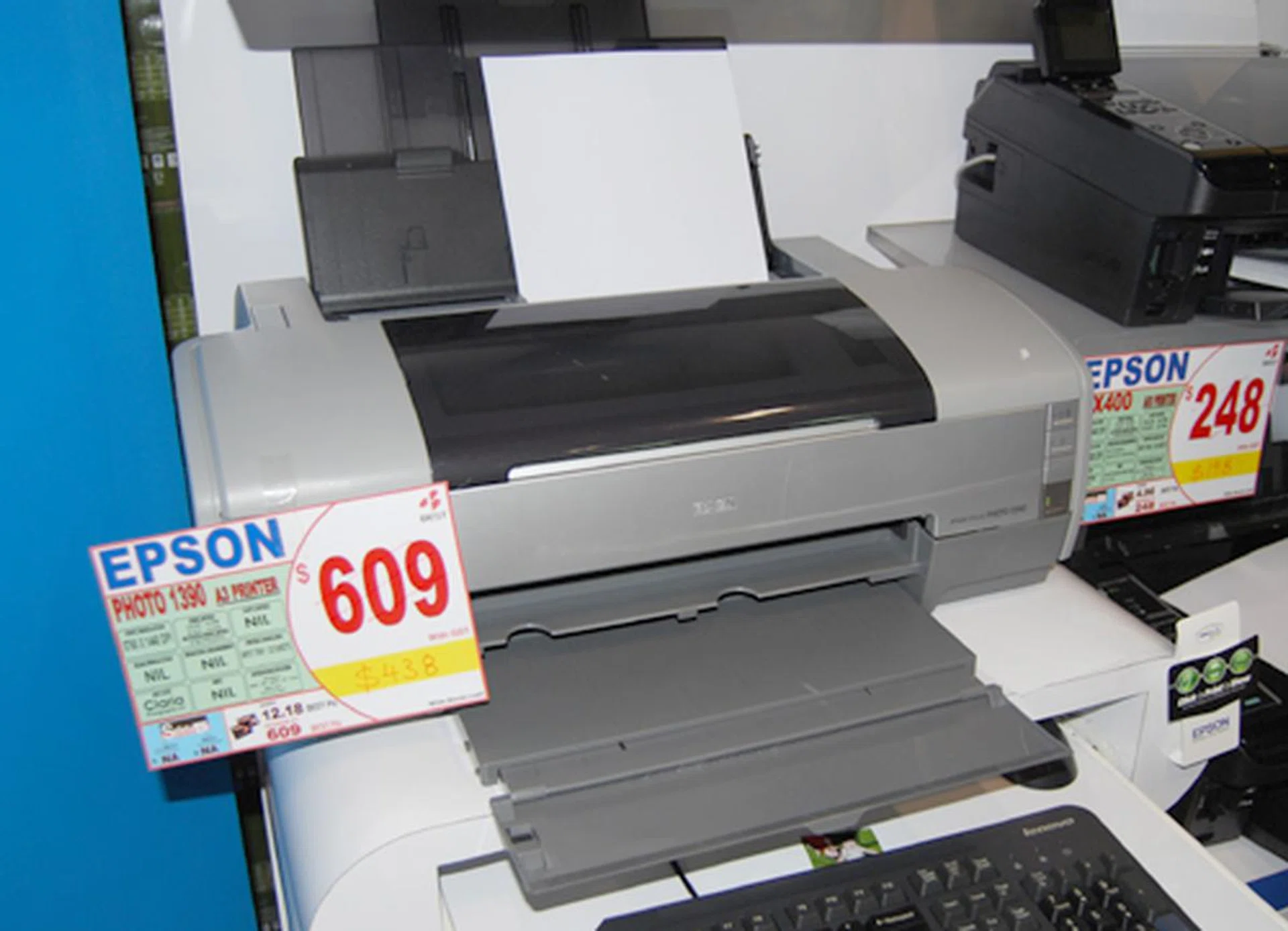  Don't let our image fool you, because the S$609 price tag is actually cancelled off and replaced with S$438 for the Epson Stylus Photo 1390, which prints up to A3+ sizes and is one of the more heavily slashed (in terms of pricing) printer in the Epson lineup for Comex 2008.  