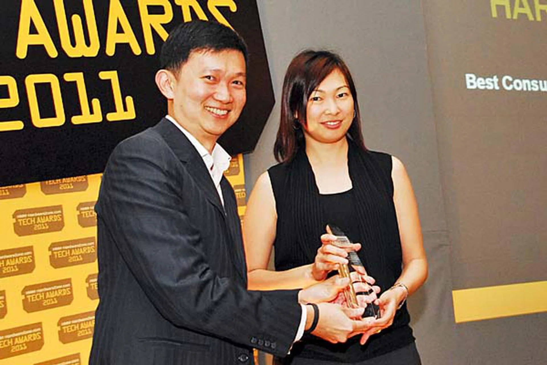 For a second year running, Harvey Norman won the Reader's Choice for Best Consumer Electronics Megastore (Singapore). Here's Ms. Jennifer Wong, Assistant Product Manager, Computers & Communications, Harvey Norman, accepting the award.
