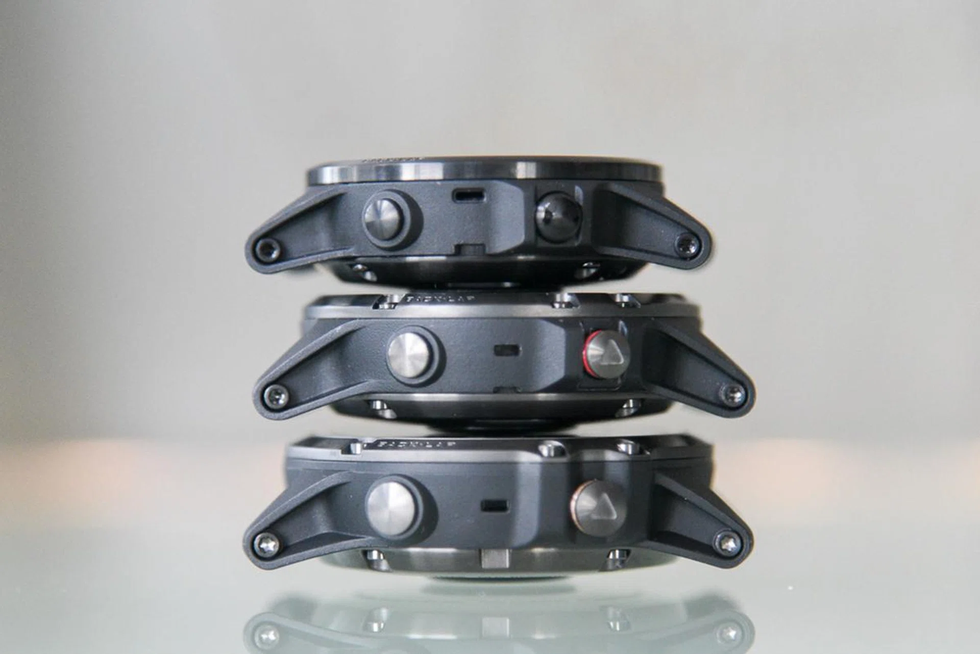 The smallest 5S Plus (top), the 5 Plus (middle), and the largest 5X Plus (bottom) are stacked on top of each other.