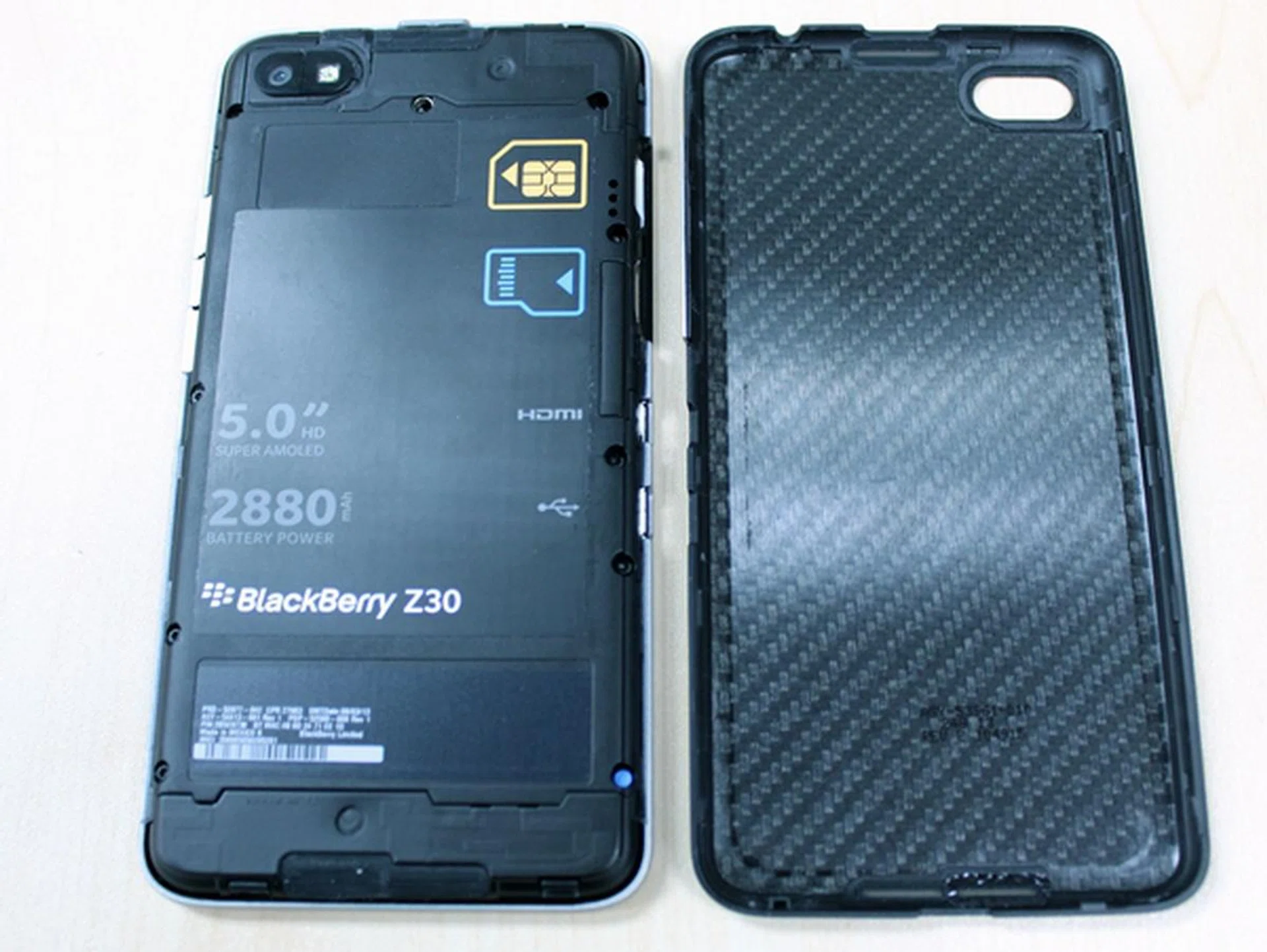 You cannot remove or replace the battery. Removing the rear cover only allows you to access the SIM and microSD card slot.