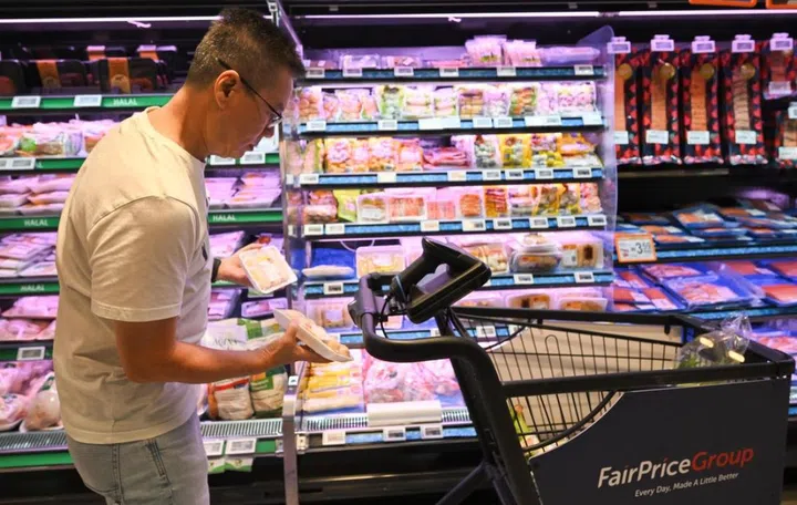 Each smart trolley features sensors that detect items. Photo: The Straits Times