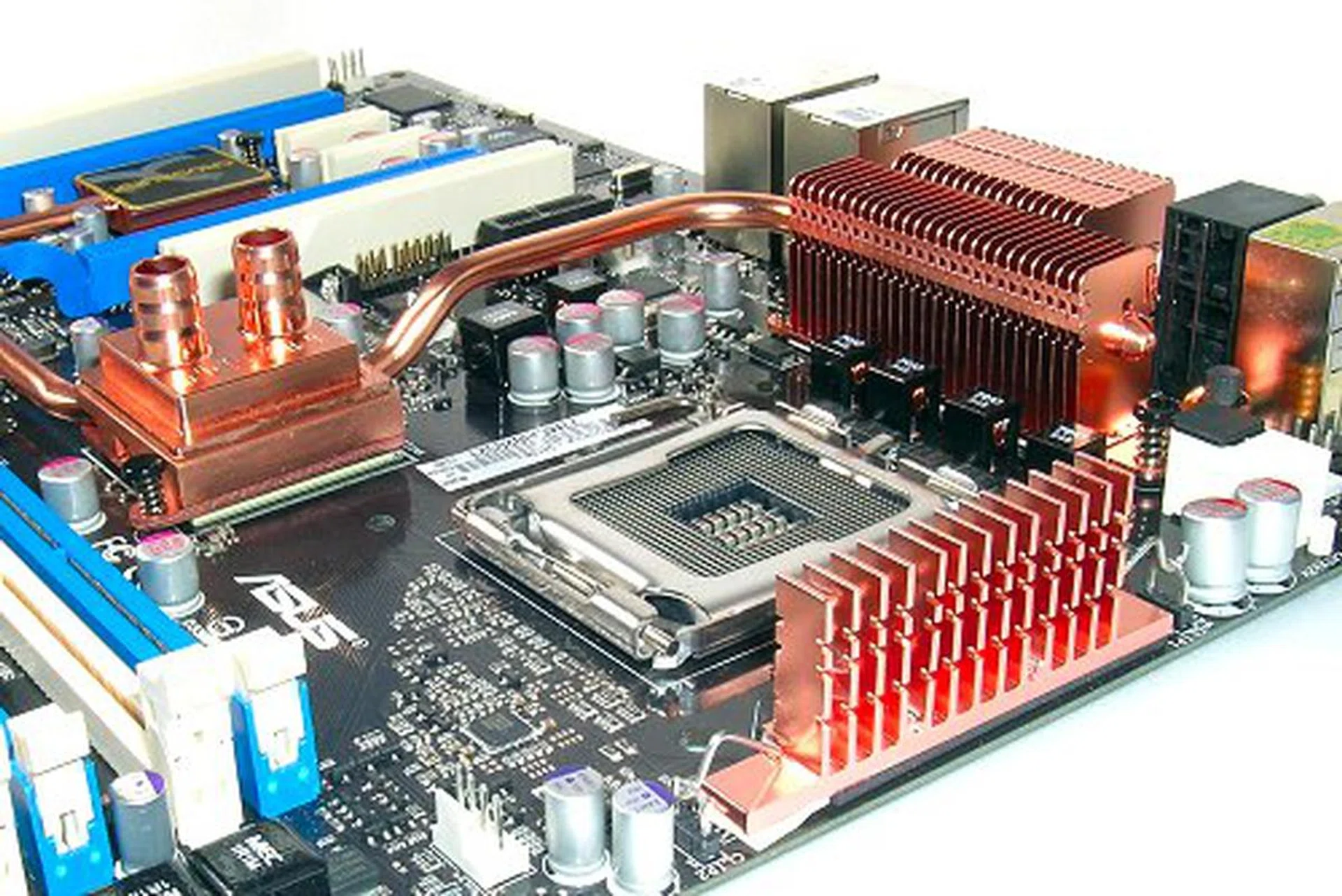 Low profile heat-pipe, thin heatsinks and the cap-less design gives the CPU socket pretty good headroom for third party coolers.