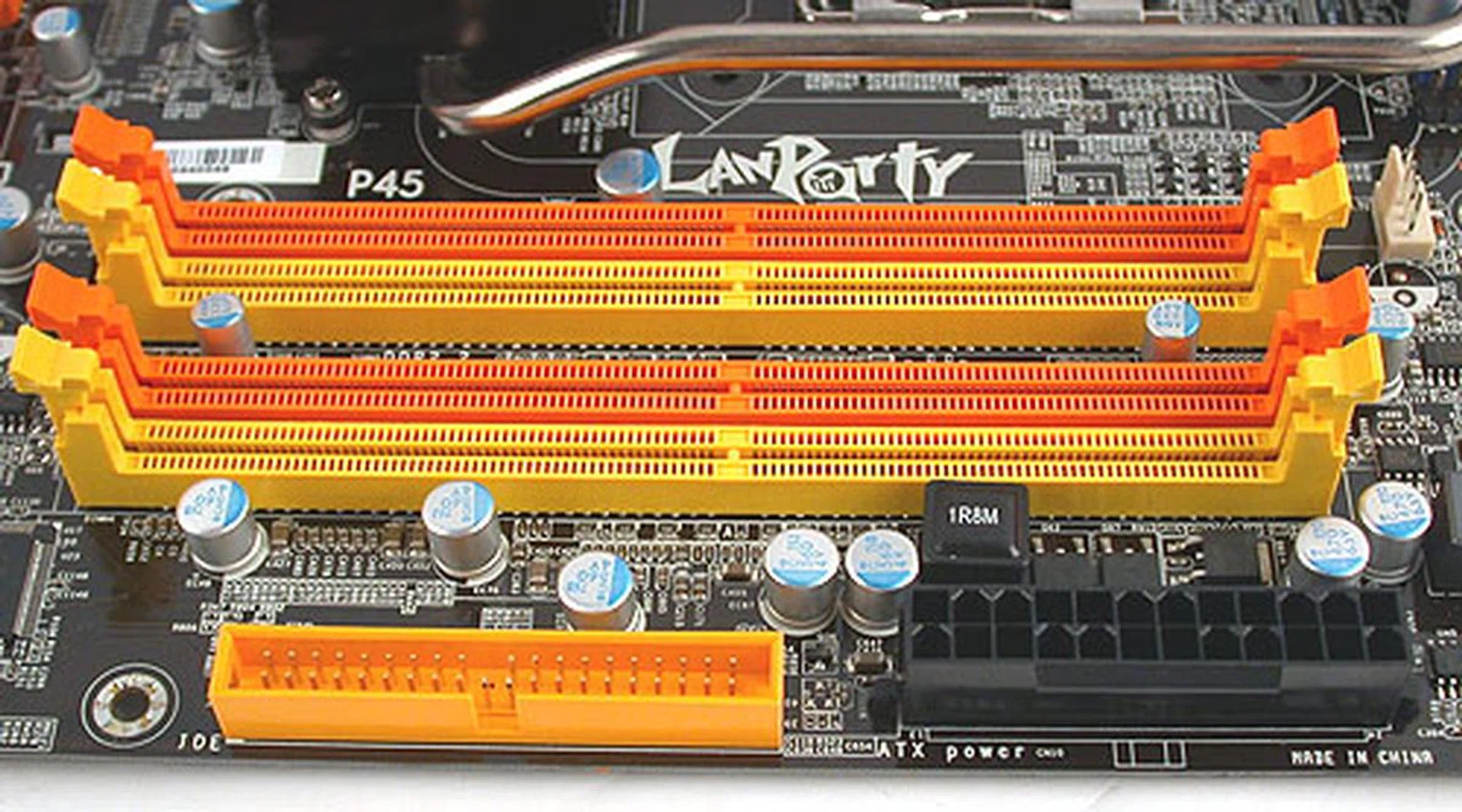 There are four DIMM slots for DDR2 memory, supporting officially up to 1066MHz and a total of 8GB. The IDE and ATX power connectors are thankfully close to the edge of the board.