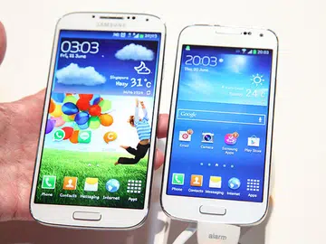The Samsung Galaxy S4 (left) compared with the Galaxy S4 mini (on the right).