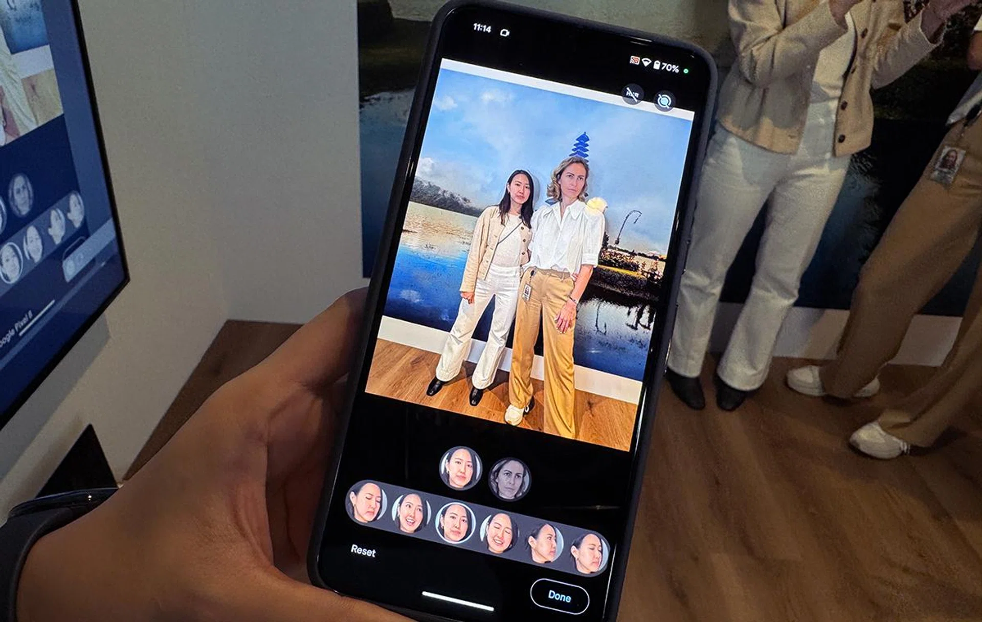 Models posing for Best Take. Face selection at the bottom of the screen are taken from the series of photos snapped within the same timeframe.