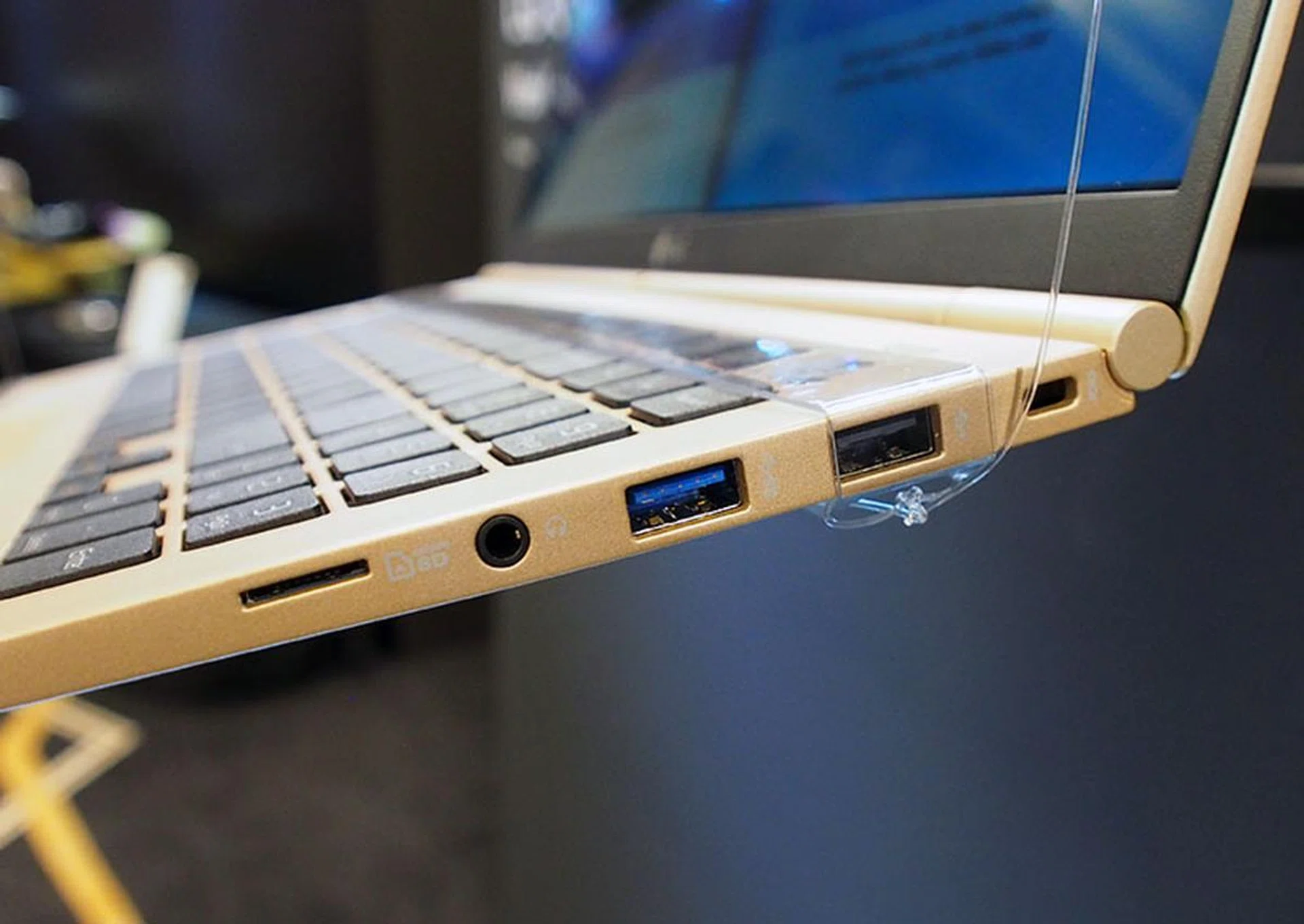 On the right is another USB 3.0 port, a USB 2.0 port, a microSD card reader and a Kensington lock slot.