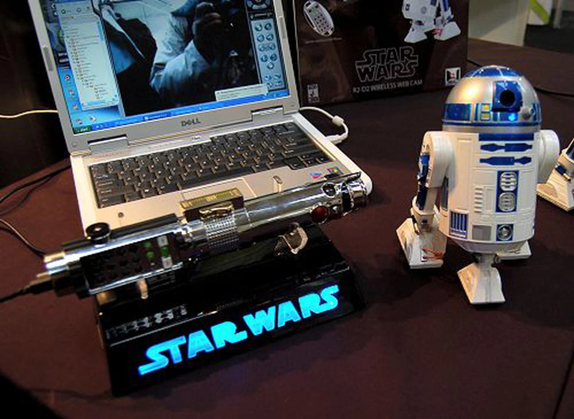  Besides the projection system, there's also an R2-D2 communication system. This is little unit is Skype enabled, has an integrated webcam, is fully motorized and can be wirelessly operated. Anakin's lightsaber acts as a remote control for the R2-D2 communication system as well as a Skype USB phone.  