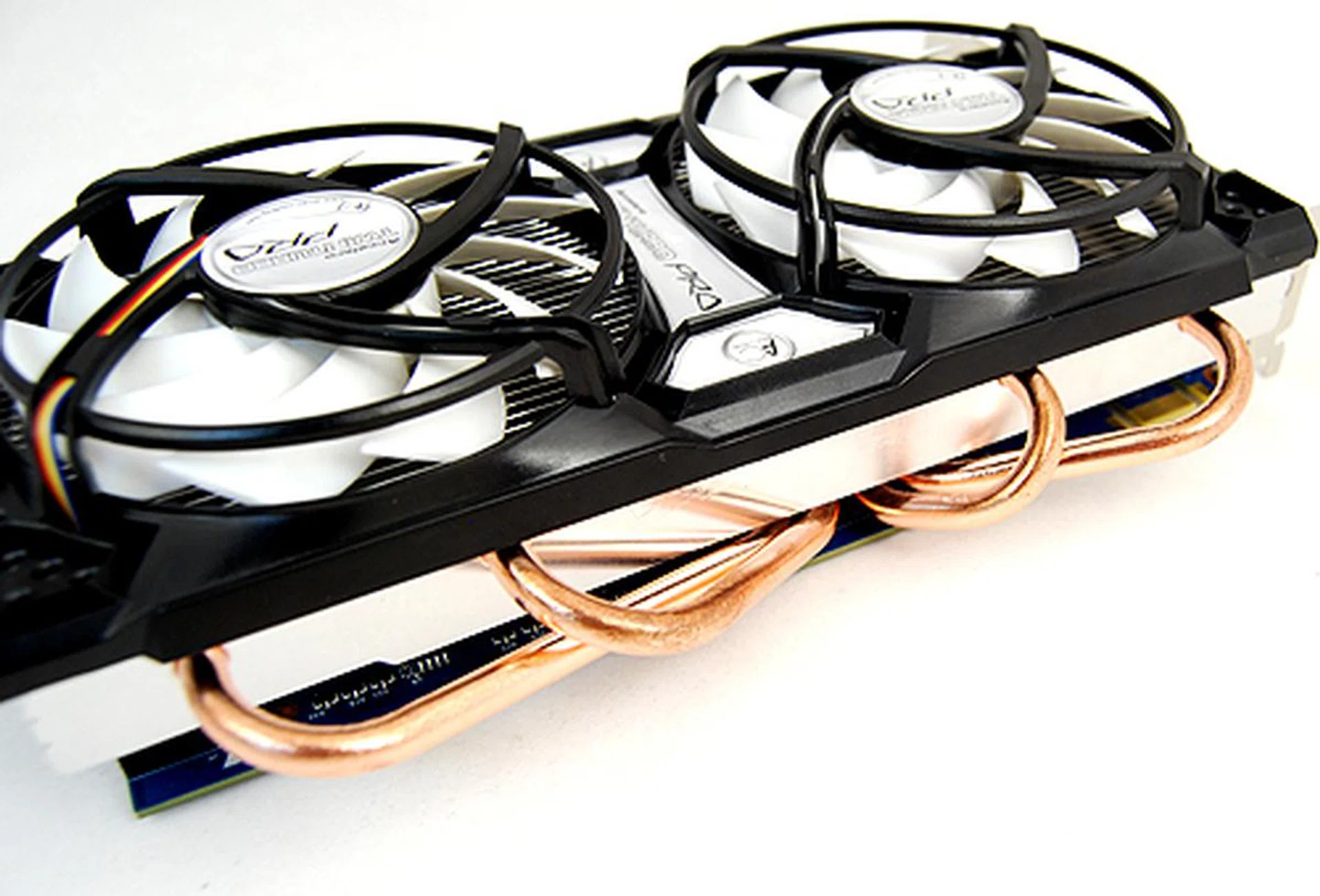 The custom cooler is massive and unlike Sparkle's implementation, the one here gets the full four copper heat pipes.