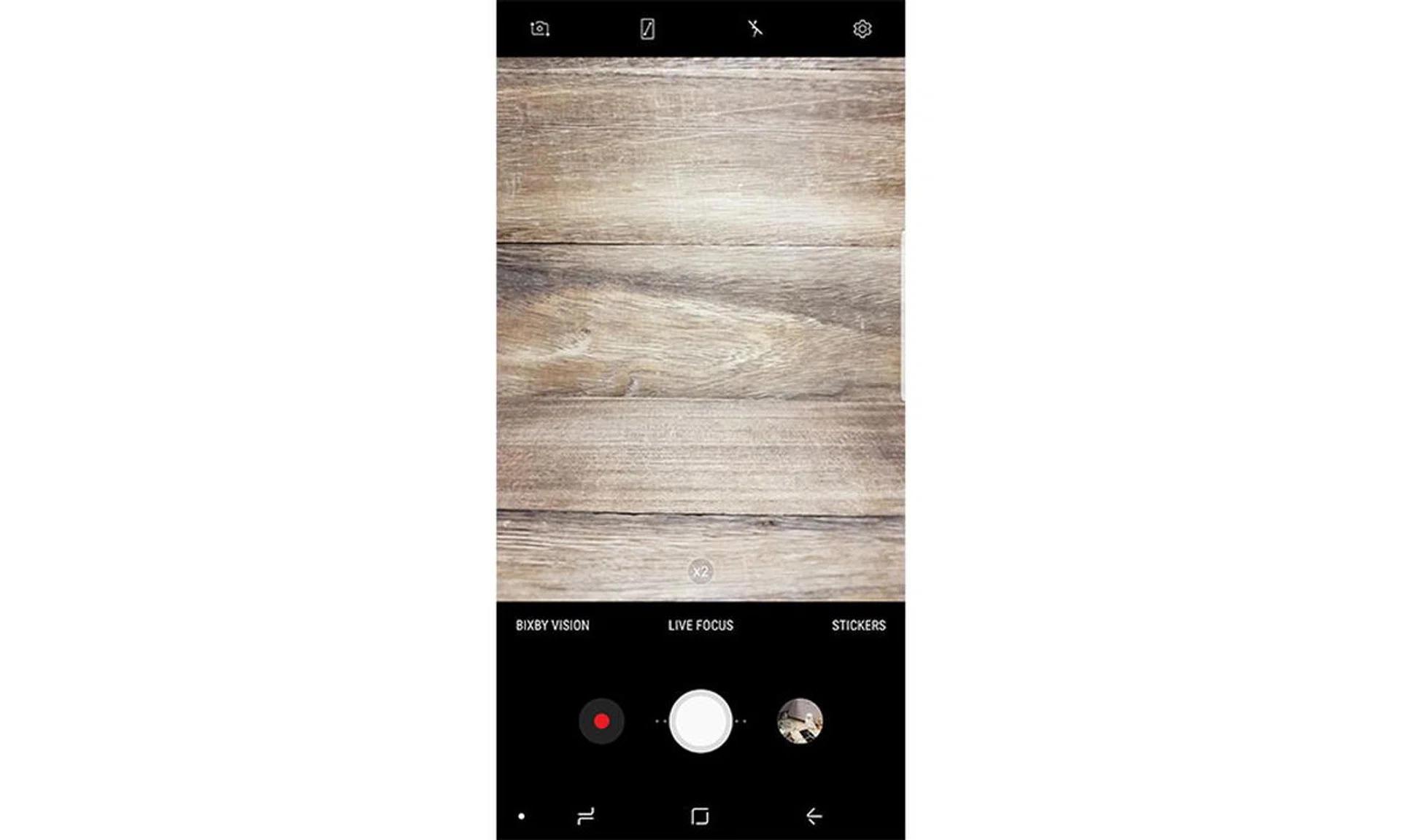 There are dedicated buttons for Bixby Vision and Stickers in Auto mode that you just can’t turn off or swap for other controls.