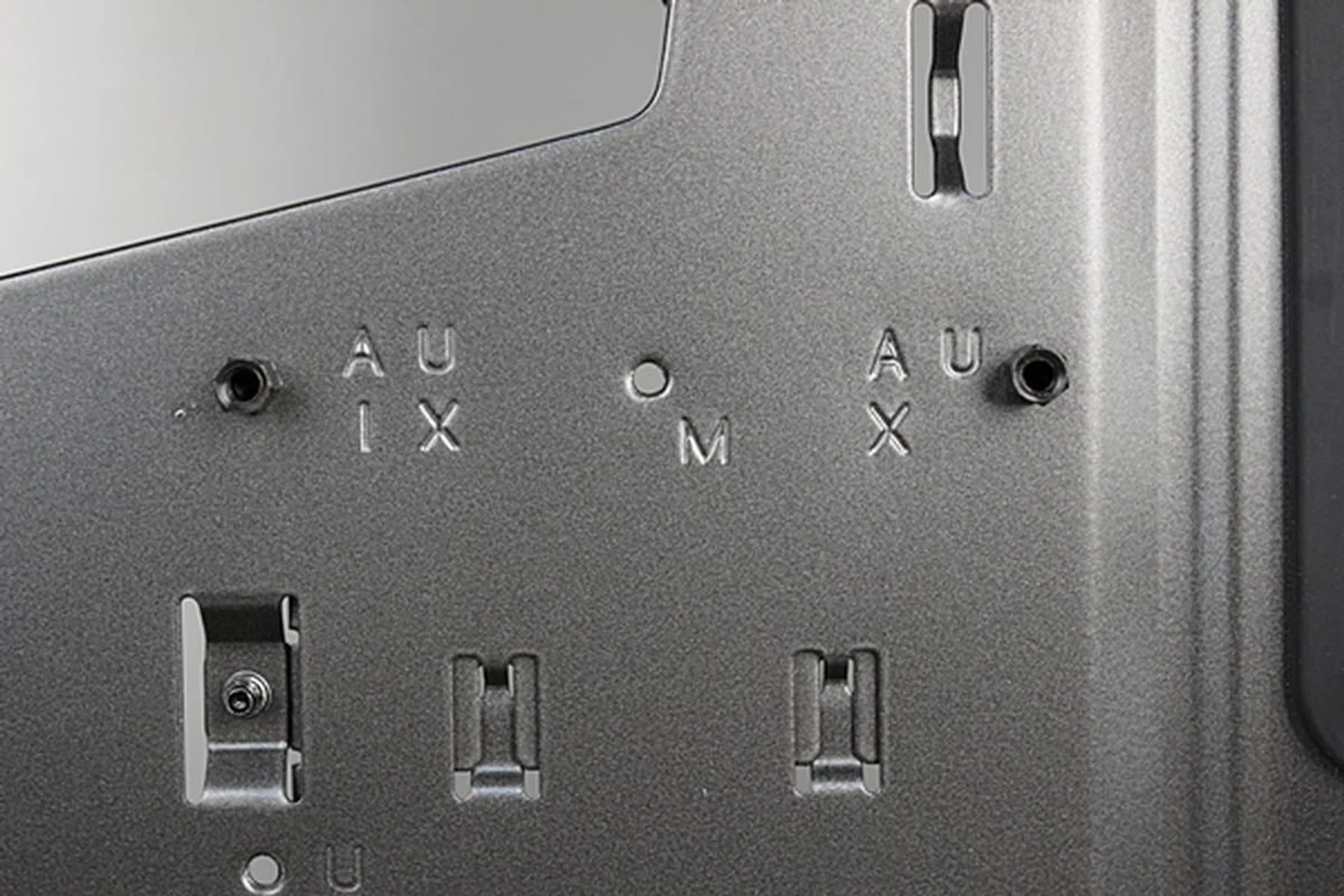 The motherboard tray comes with pre-installed standoffs for easy mounting of the board. It also has indications of which mounting hole can fit the commonly supported motherboard form factors.