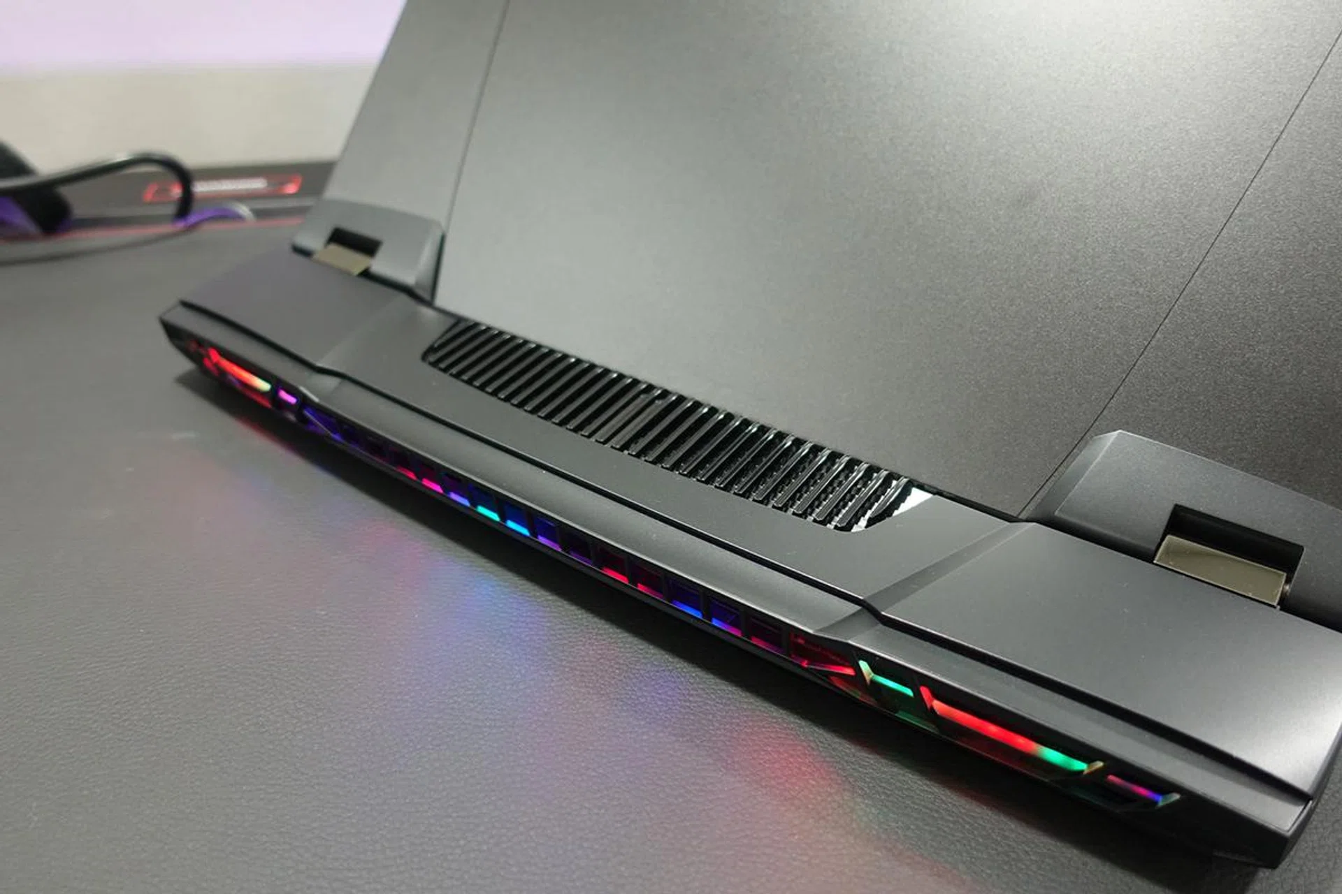 With great power comes great heat. The Titan GT77's large size affords it more ventilations to draw out heat produced by the very-hot Core i9-12900HX and RTX 3080 Ti processors.