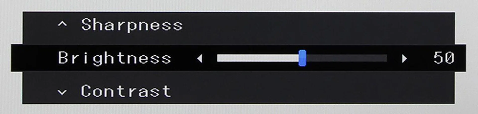 Protip: To quickly reach the brightness slider, press the up button twice.