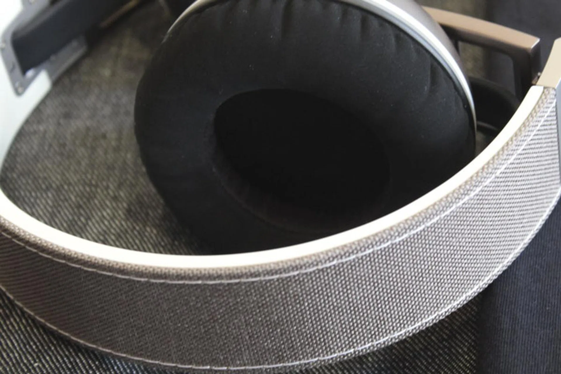 The fabric wrapped headband is nice and comfortable, while the cushions are plush and supportive.