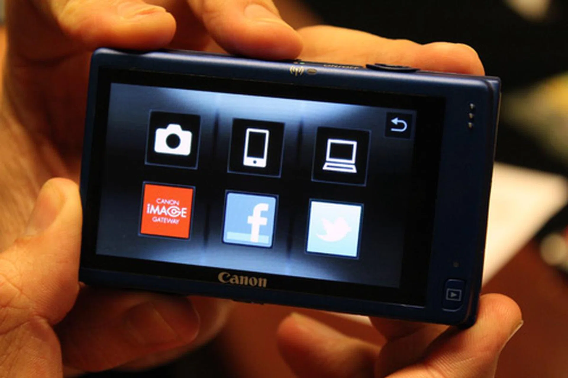 The fresh user interface on Canon's new Wi-Fi compact cameras allows you to upload and share images straight from the camera. Tapping on an icon lets you share to that location, for example tapping on the Facebook icon lets you share to your social network.