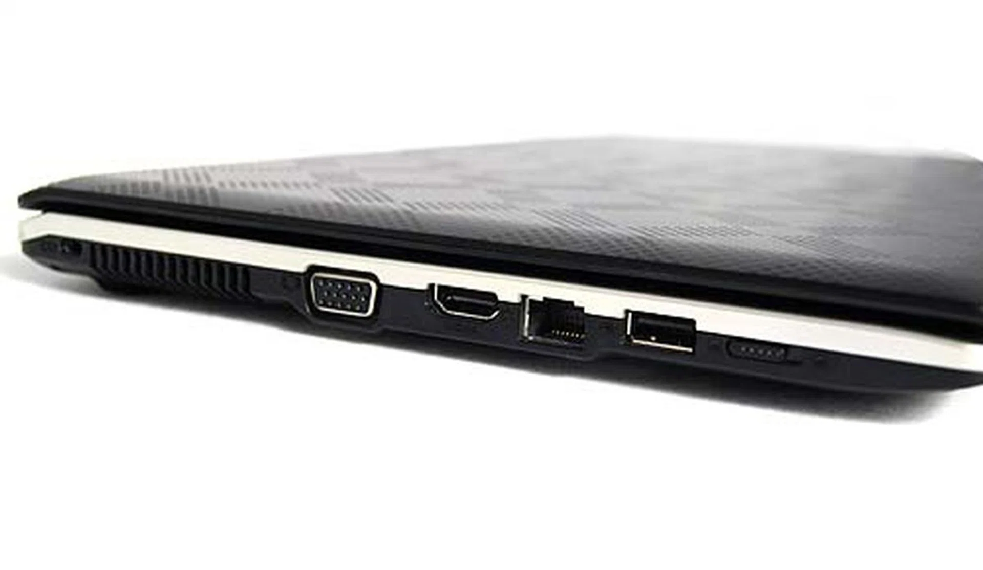 The left side does more for connectivity in the form of a VGA output, HDMI port, LAN port, another USB 2.0 port and the wireless switch.