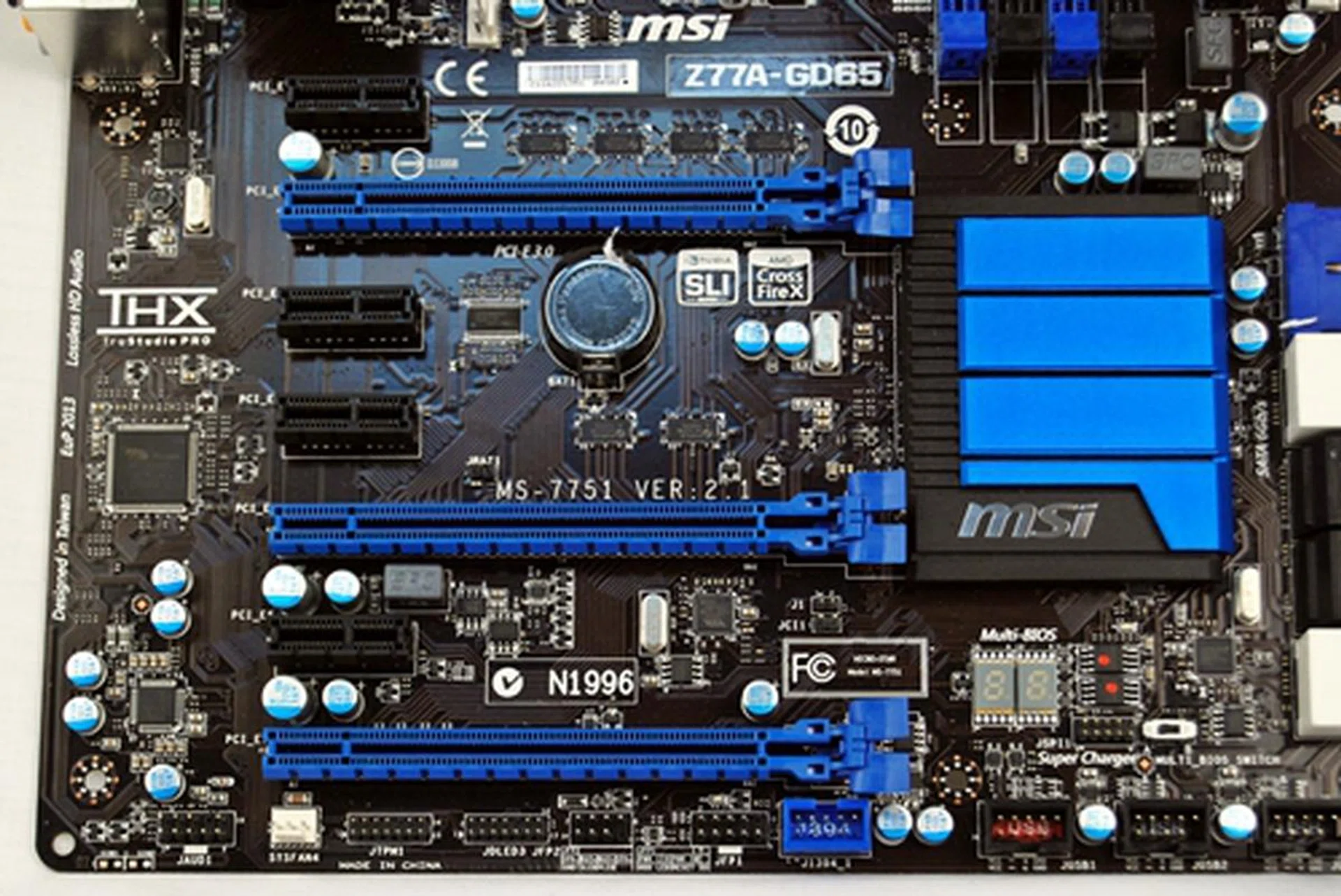 The board sports three PCIe Gen3 PEG slots (easily seen by their huge latches on this board) and four PCIe 2.0 x1 slots. The board has plenty of room for a multi-GPU setup.