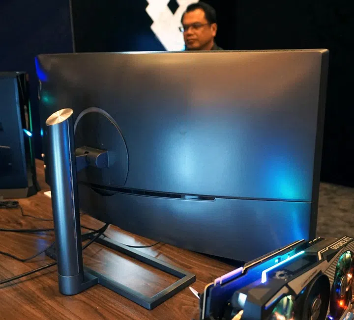 A rear view of the expansive monitor.