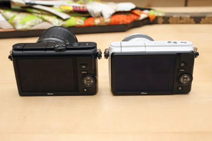 Both the J3 (black) and S1 (white) feature a clean and simple design. 