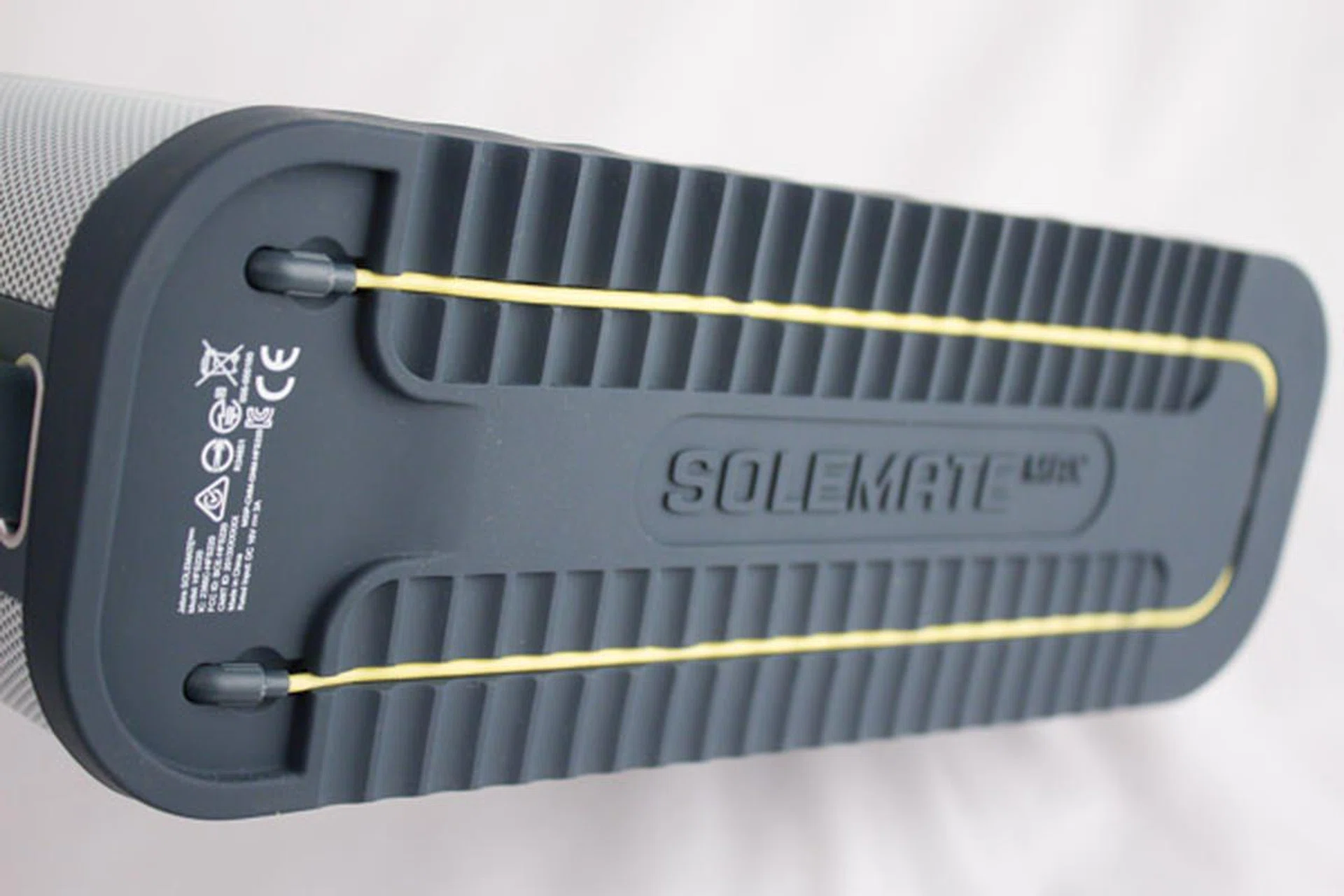 The shoe tread design helps hold your Solemate Max in one place and it's even able to conceal an audio cable too.
