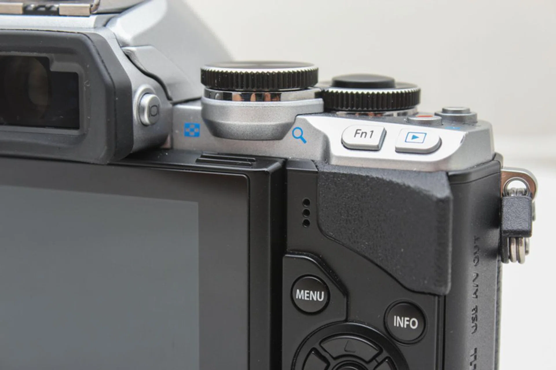 The E-M10's controls feel less cramped than the E-M5's, especially these two, which are now elevated at an angle instead of recessed in.