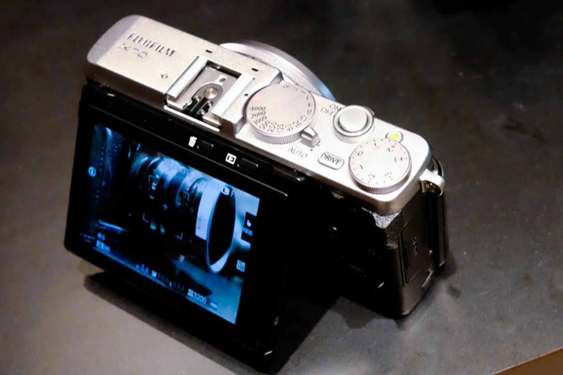 There's very little space on the Rear LCD, but Fujifilm has still managed to squeeze two buttons on it.