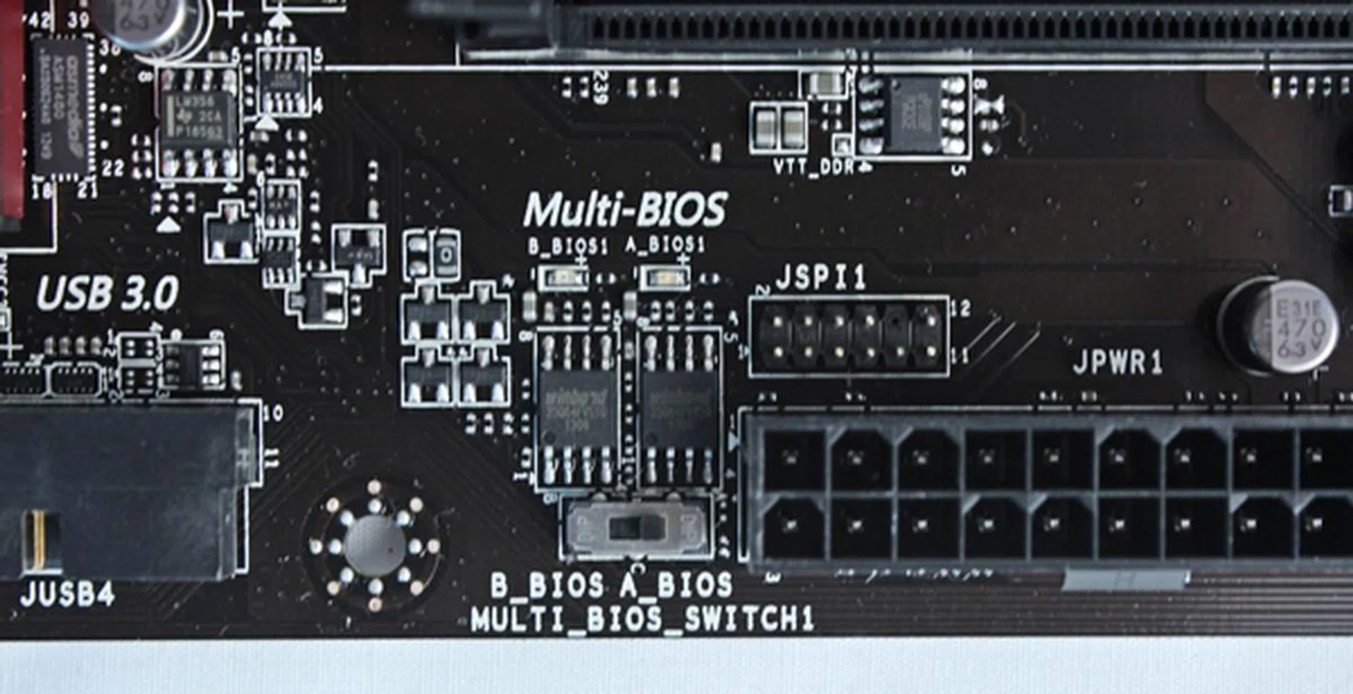 Just above the Winbond BIOS chips, there are two LEDs that will light up to indicate which system BIOS is currently in use (blue LED represents BIOS ROM A and the green LED is for BIOS ROM B).