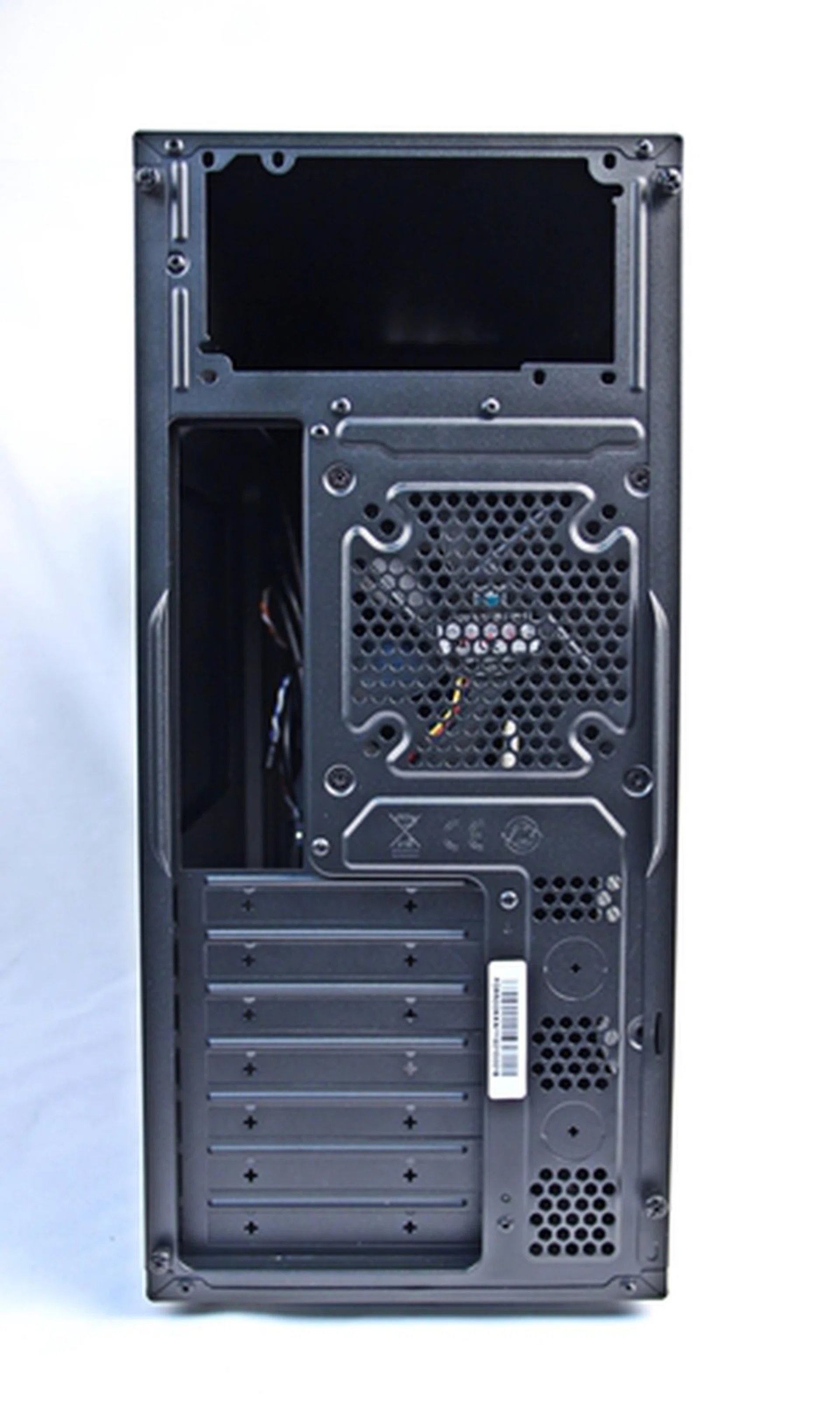 Most of the casings characteristics at the rear give way that the CM Force 500 is an entry-level chassis - from the top mounted PSU, to the old-school expansion slot covers that need to be forced out and the sole rear 120mm cooling fan bundled with the case.