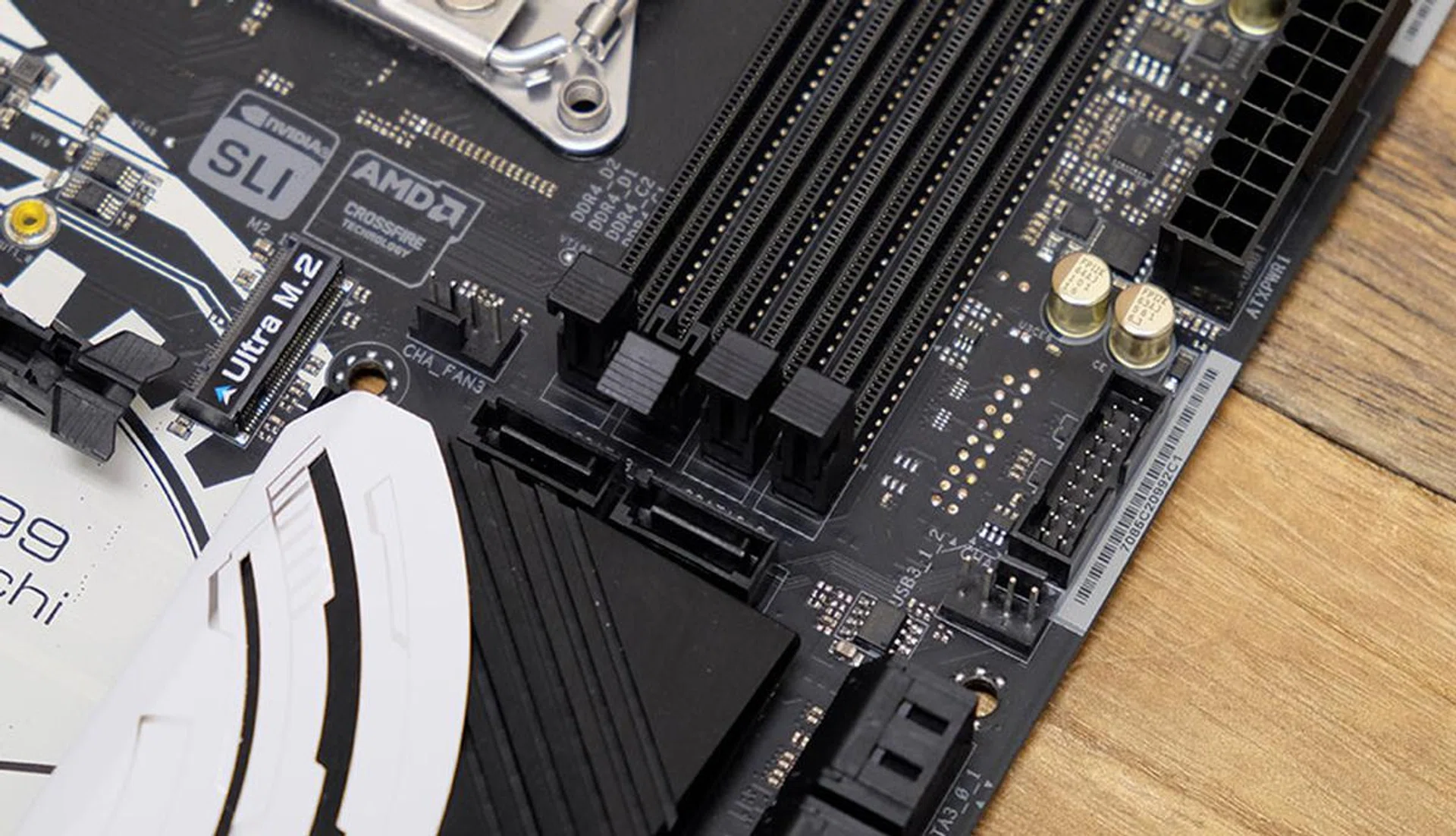 The two remaining ports are located face up below the RAM slots.
