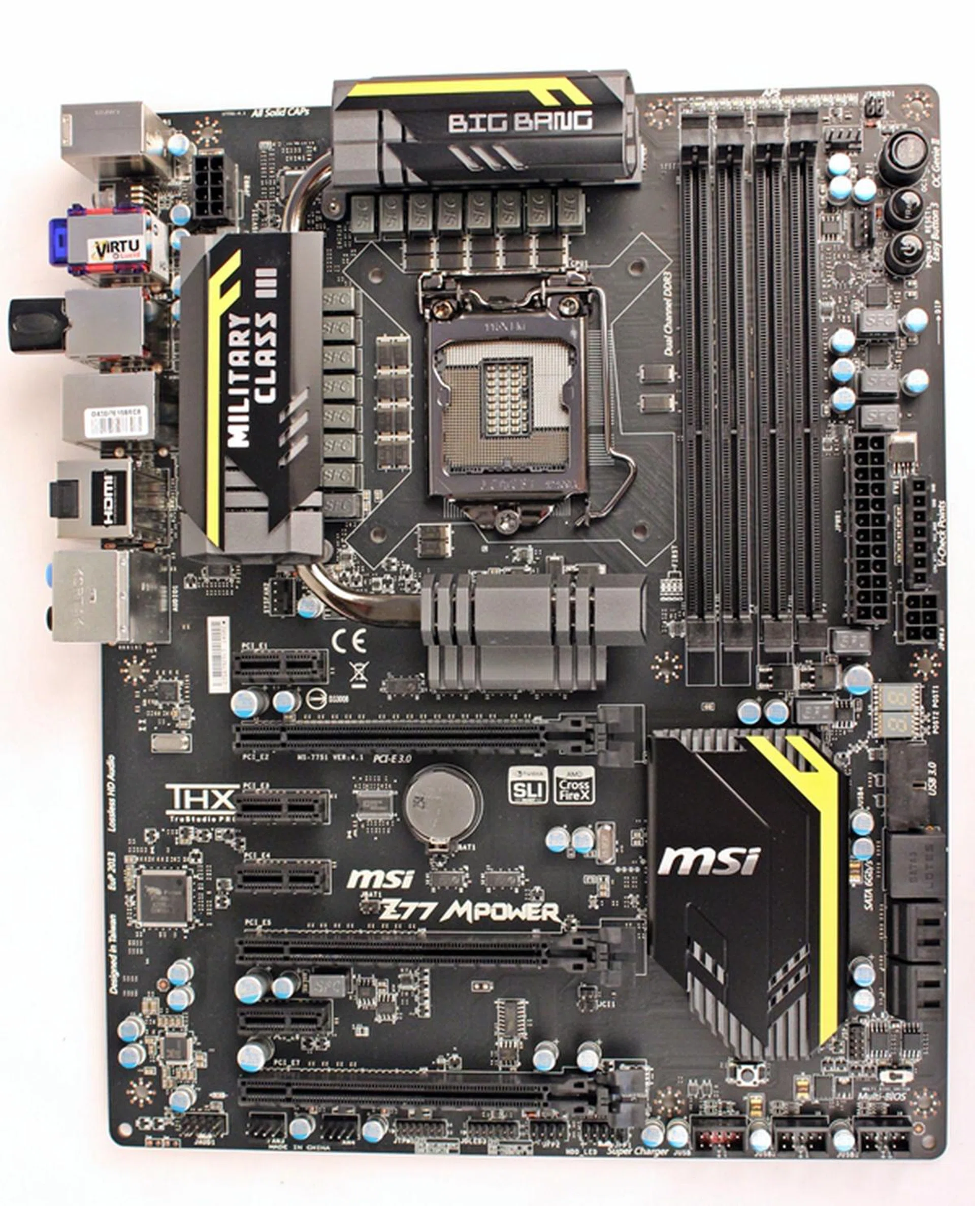 The MSI Z77 MPower board sports a rather muted color scheme. Set against a black PCB, with free flashes of yellow stripes to break its dark monotony, it belies the true prowess of the board, its OC Certified capabilities.