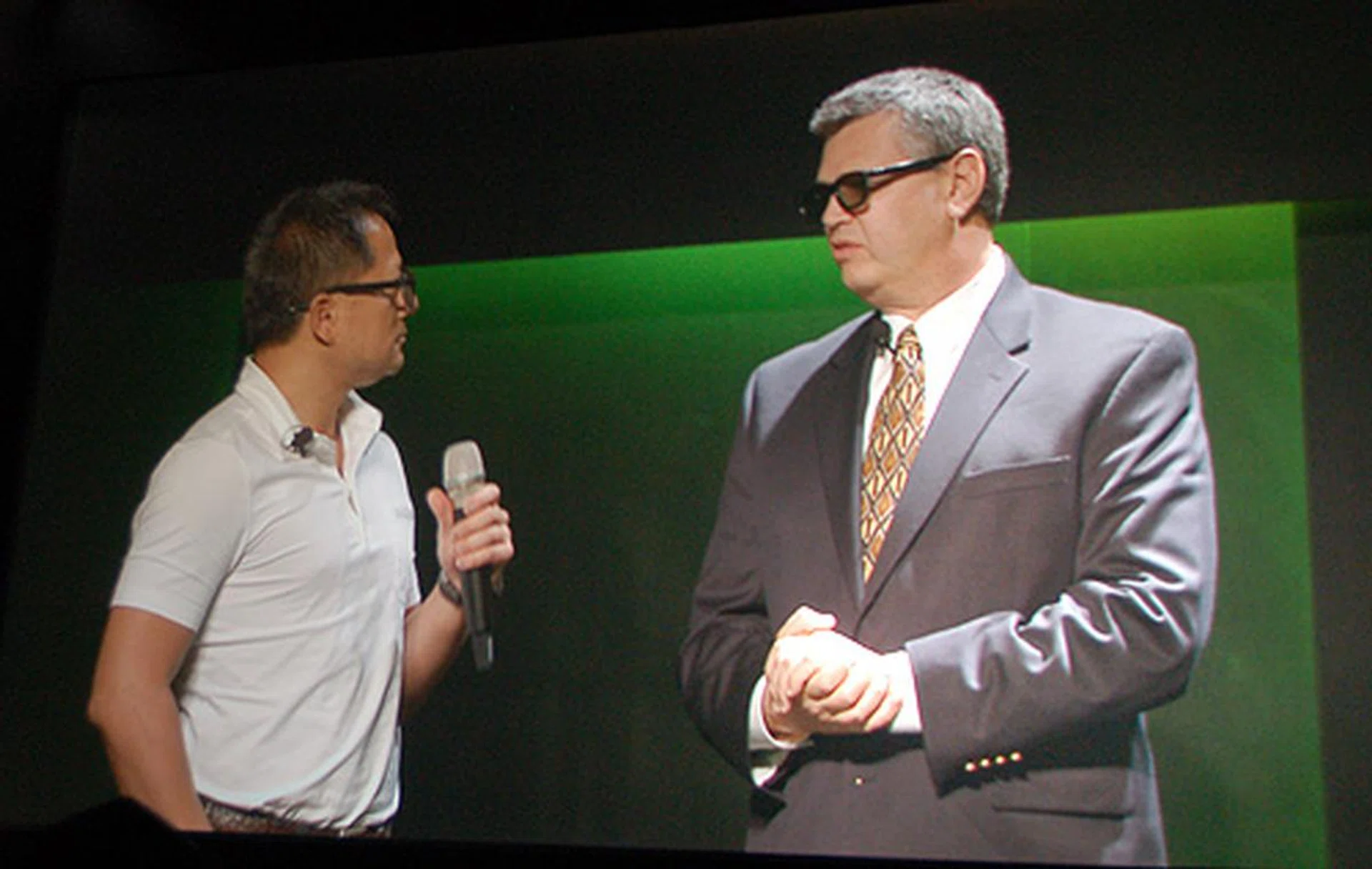 Jen-Hsun and a representative from Microsoft share a moment on stage, discussing about the possible implications of streaming 3D over the Internet.