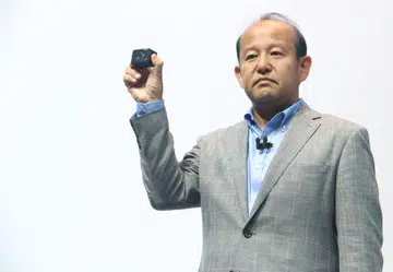Kumekawa holding Sony's new RX0 digital camera.