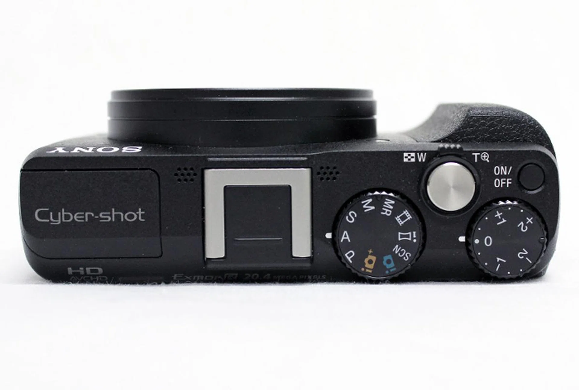The HX60V comes with a hot shoe so you can mount an external flash.