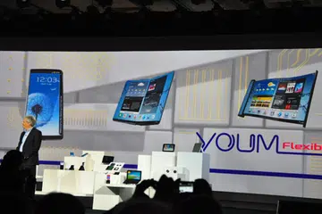 Samsung showed various possible uses for the flexible screen technology, including a screen rolling out of a thin storage tube.