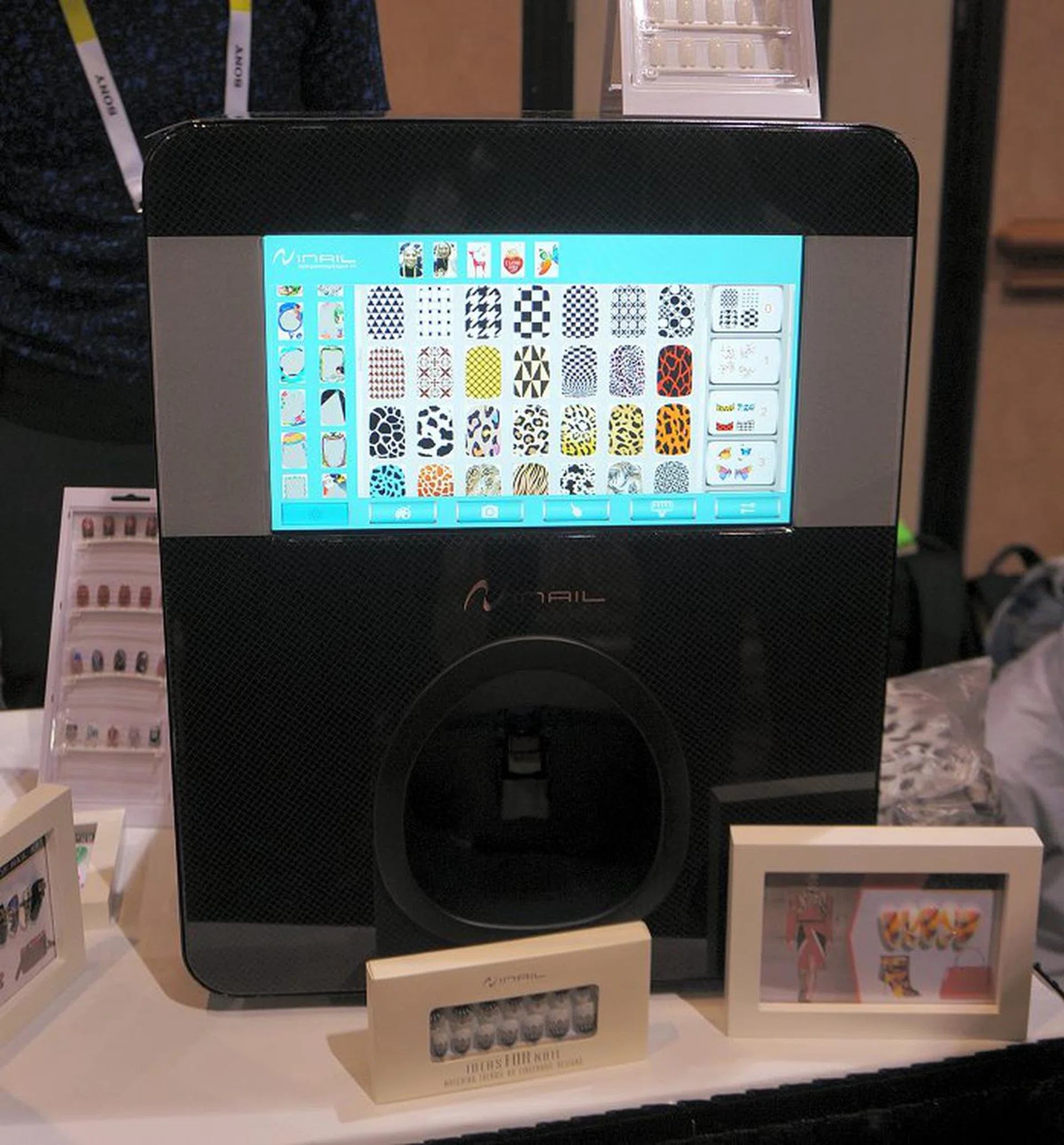 The Inail intelligent printer is able to print really intricate designs in 5 minutes per fingernail.