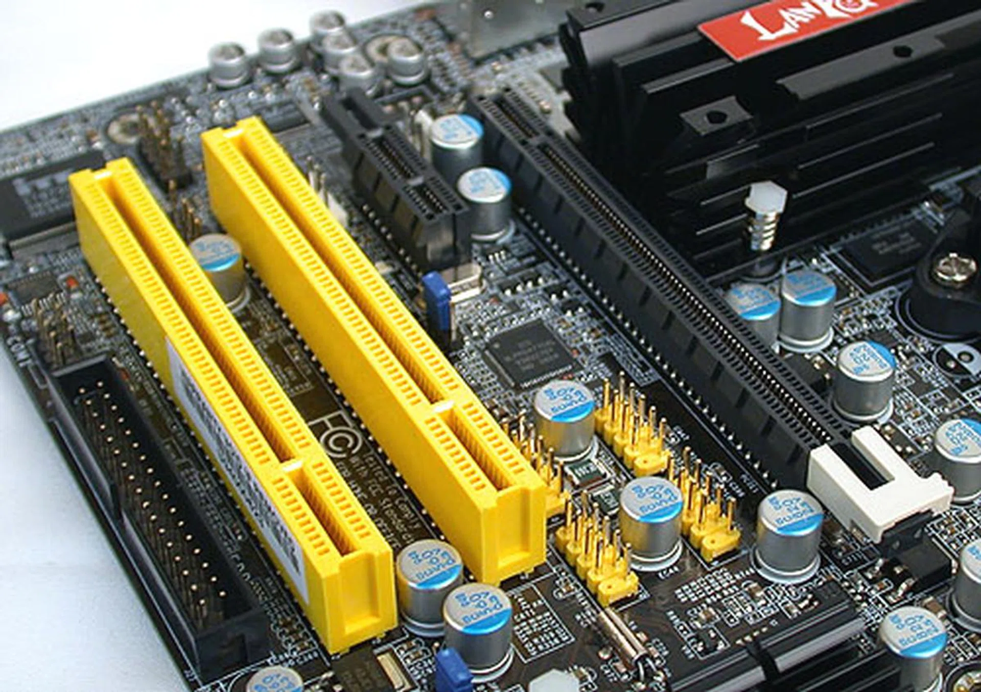 There's only so much one can do with limited PCB space and this arrangement of the expansion slots is fairly standard and usable. However, the location of the USB headers is another story.