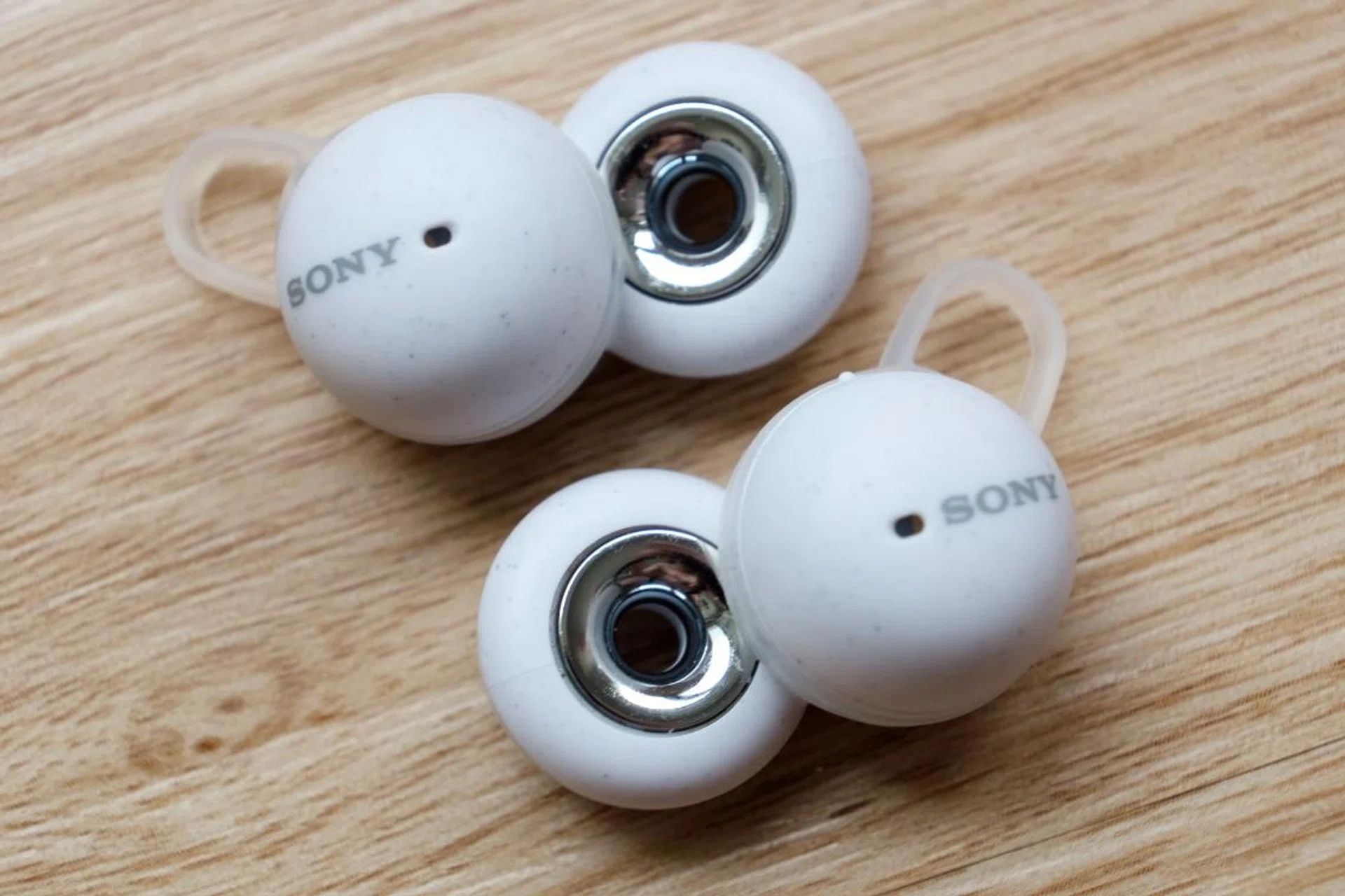 The LinkBuds have a hole to let you hear your surroundings clearly.