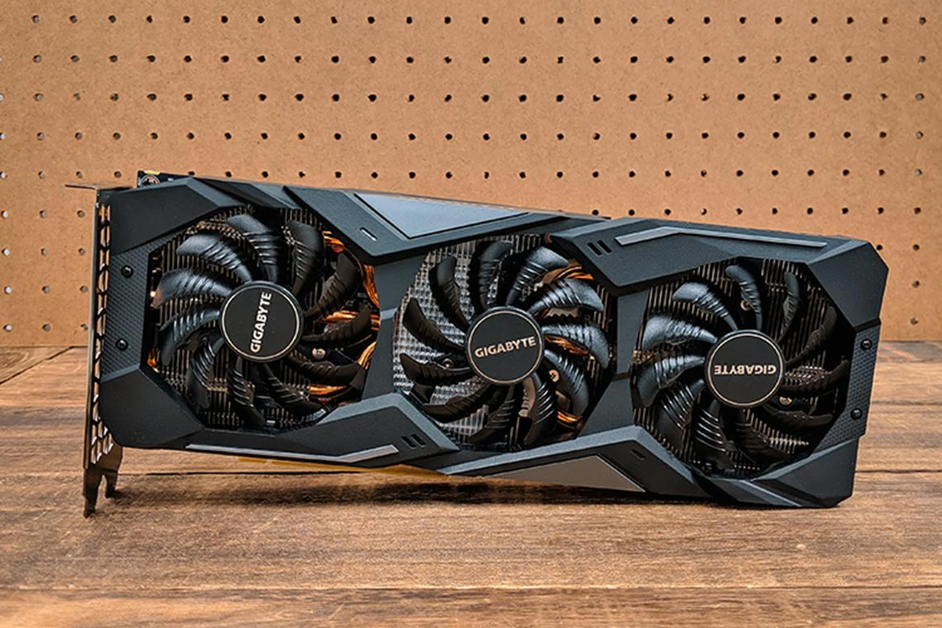 The triple-fan cooler is probably a bit of an overkill for this card. 