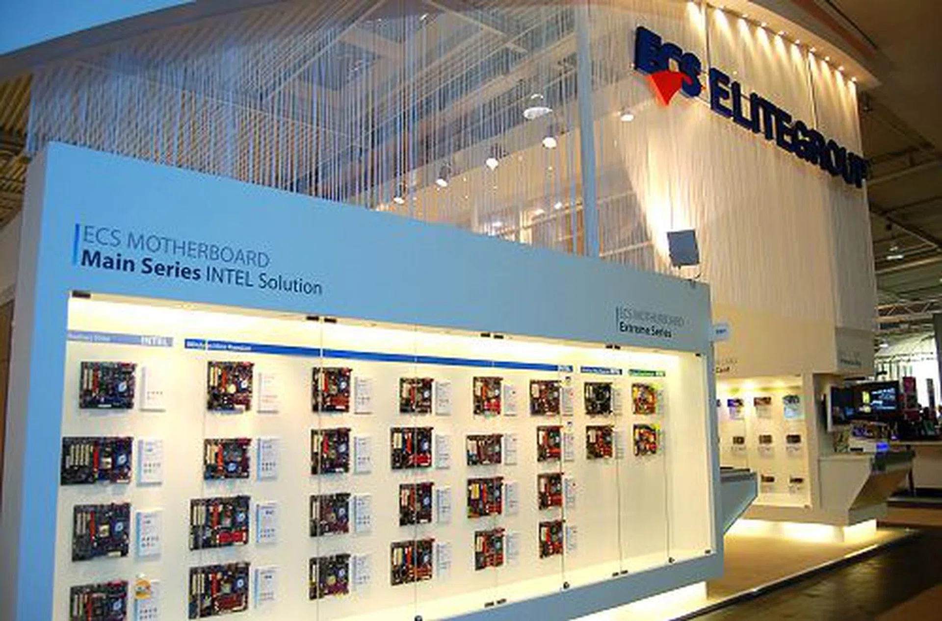  ECS had quite a big booth space, but their motherboard display was their main attraction.  