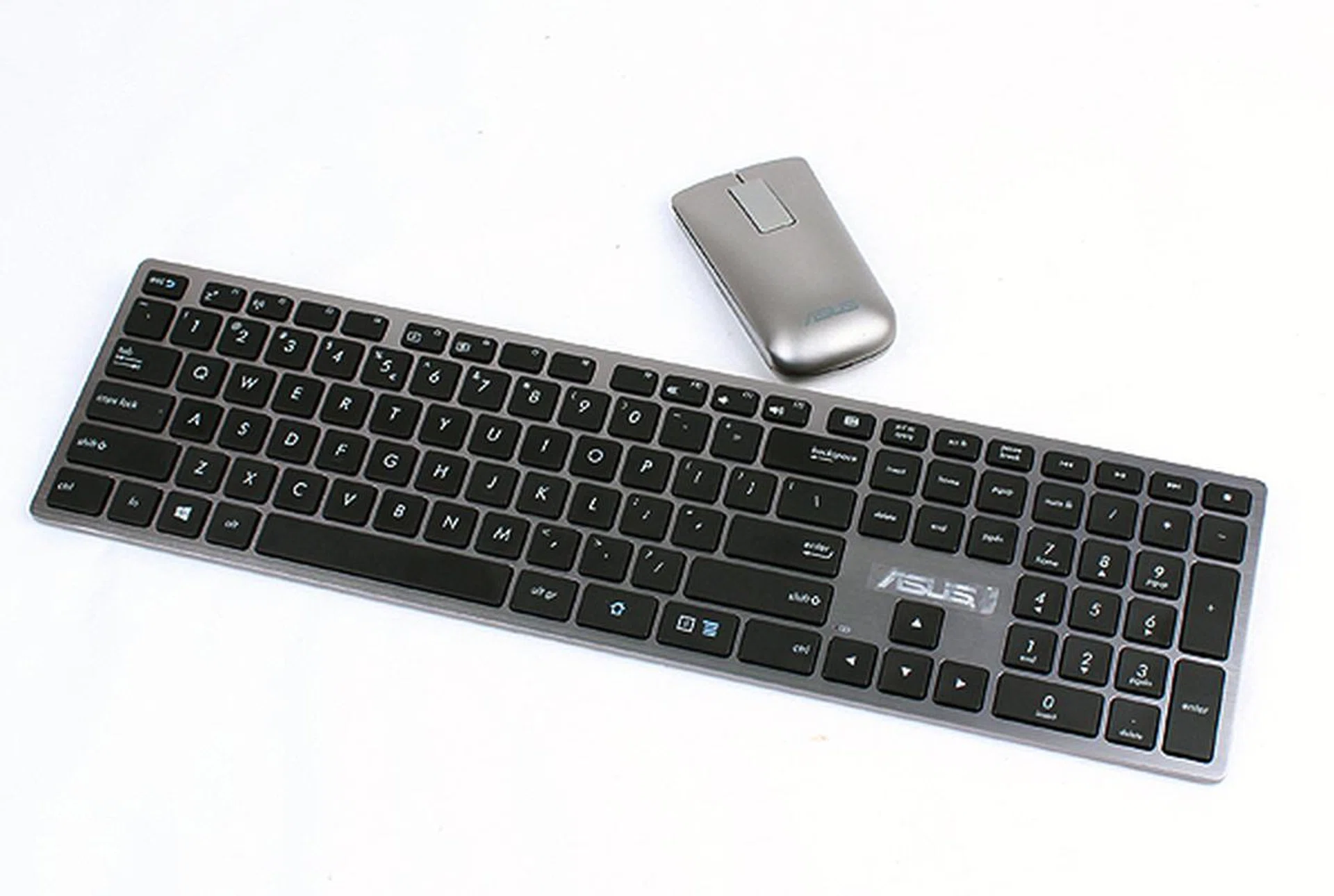 The provided wireless keyboard and mouse combo is not the best in the world as the keyboard felt a tad flimsy. The mouse features haptic technology, which takes some getting use to.