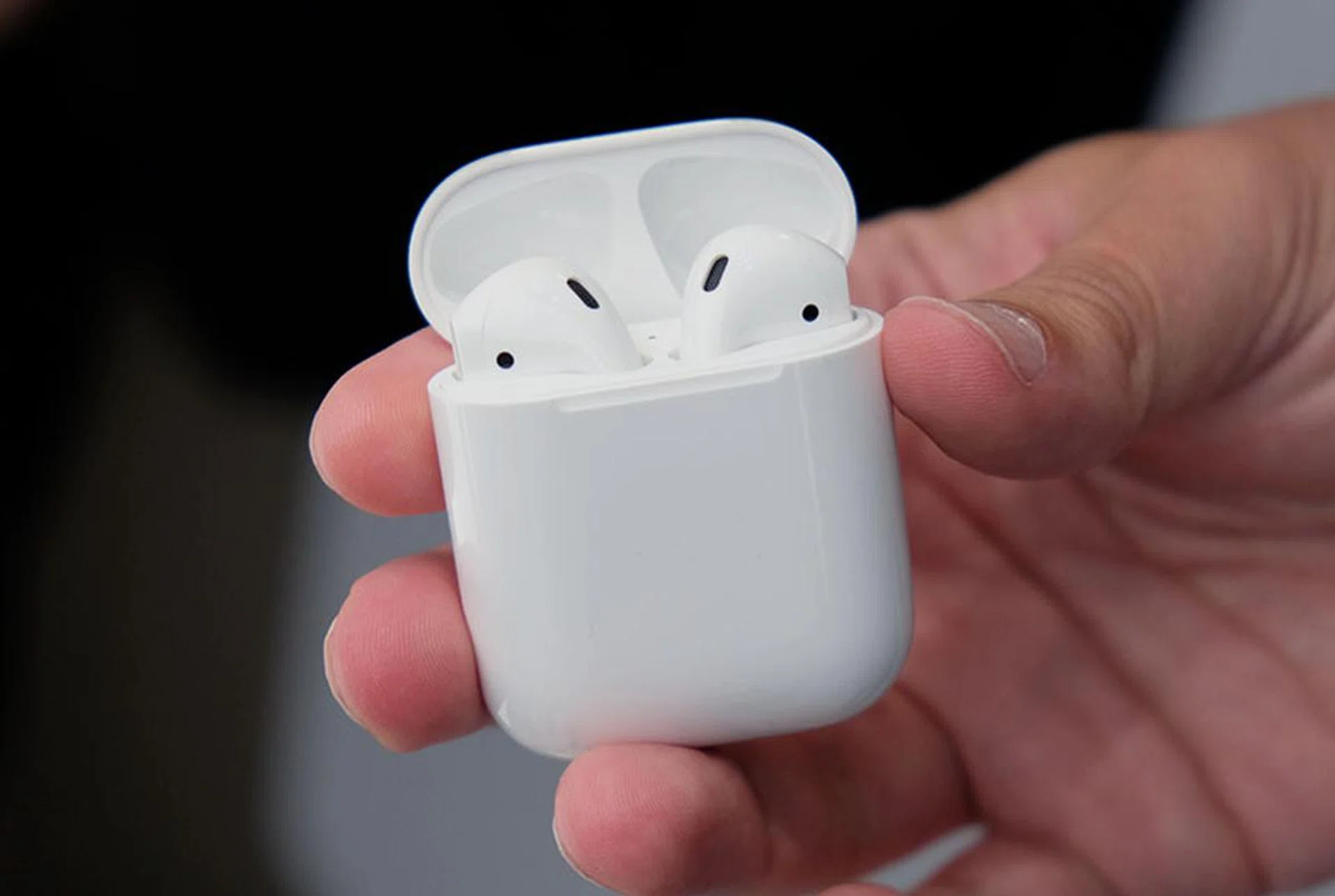 The EarPods slide into the charging case when not in use. The case provides up to 25 hours of listening.