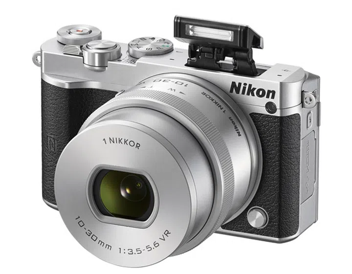 The J5 retains a pop-up flash. 