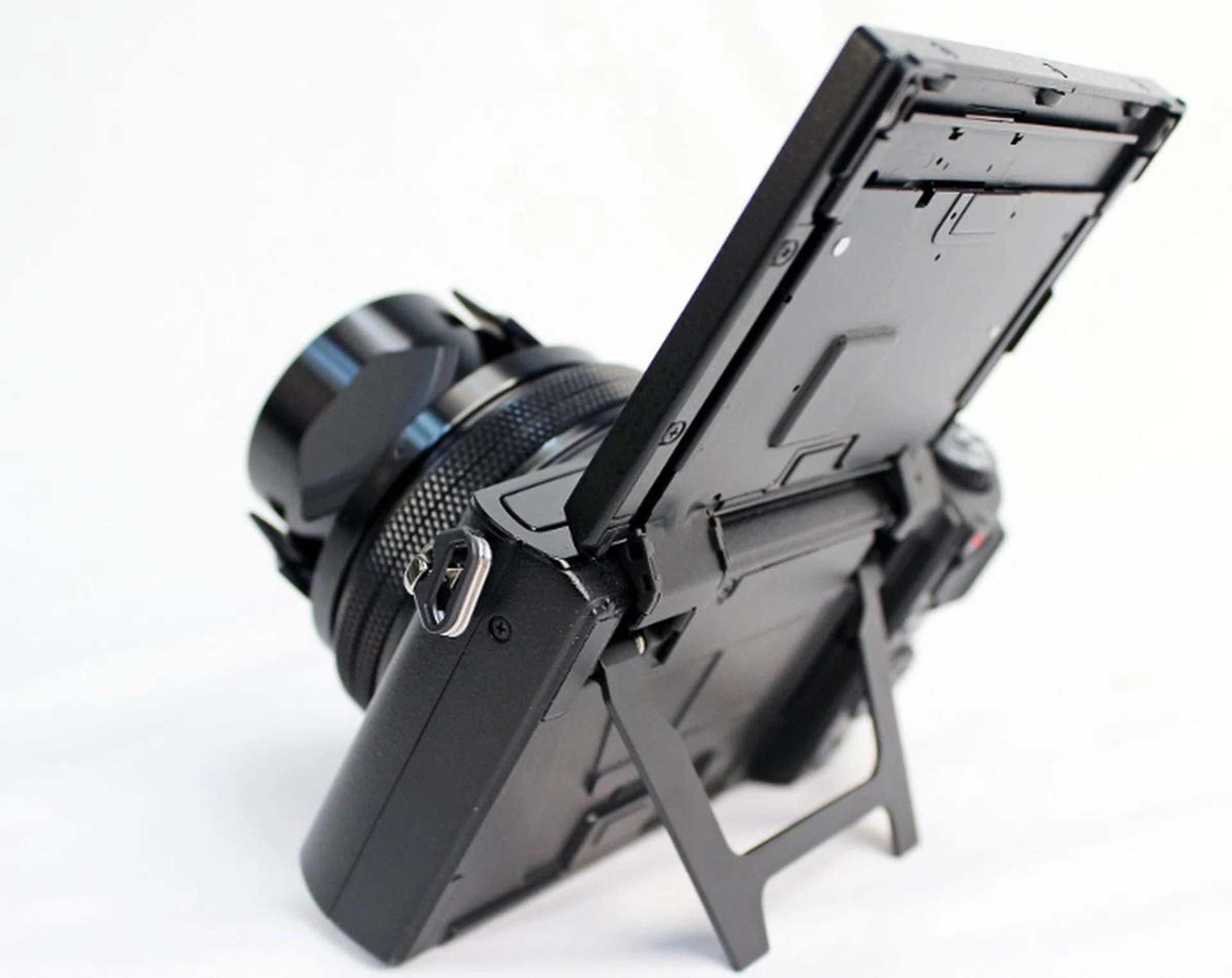 There's also a built-in stand beneath the display so you can set it on a surface when taking timed shots or selfies. These are small enhancements that bring about better camera usability for the masses.