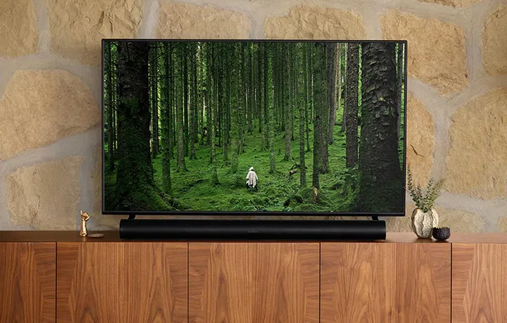 Sonos Arc under the TV set.